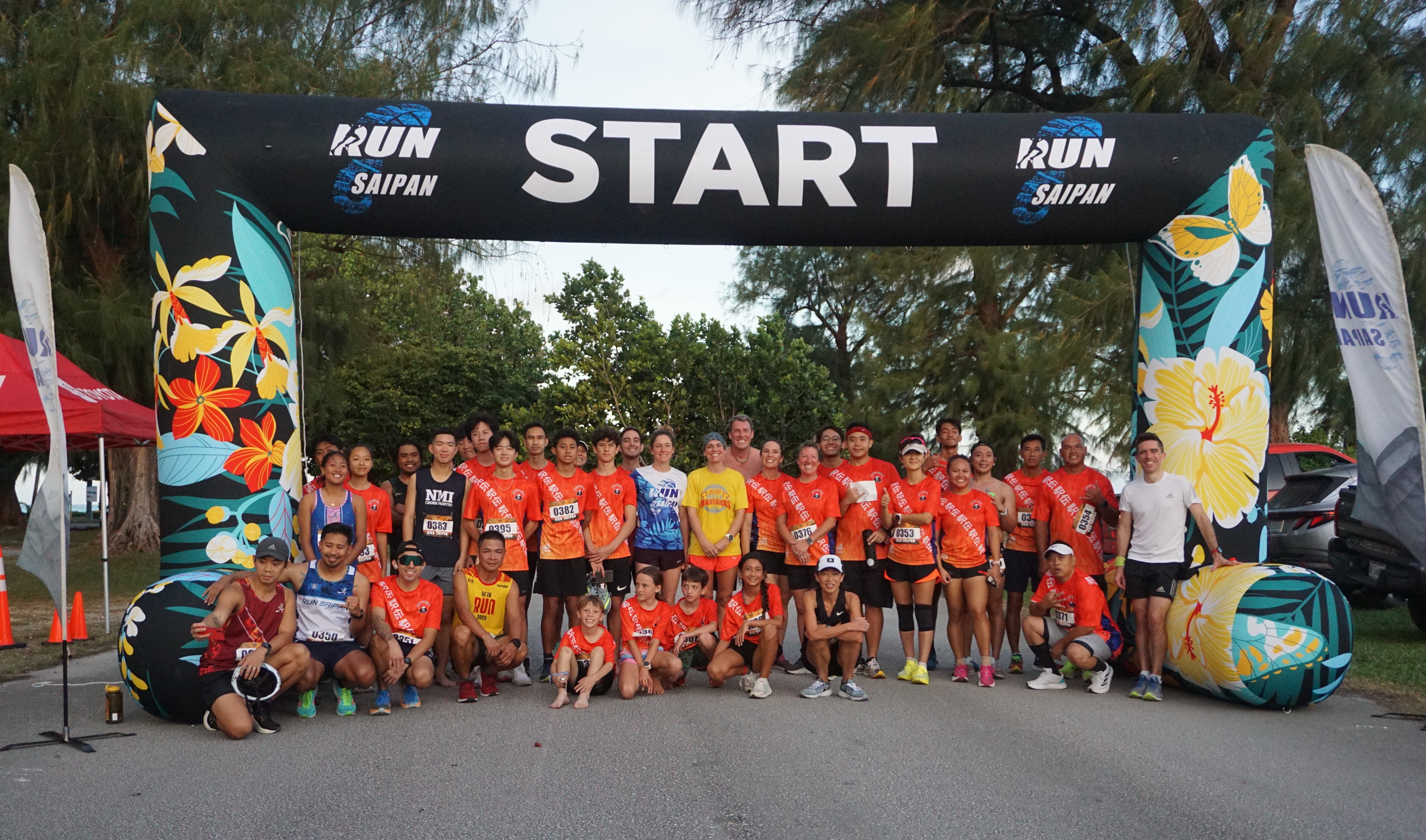 The participating teams pose for a photo after completing  Run Saipan’s 4th Marianas Ekiden at Micro Beach on Saturday.