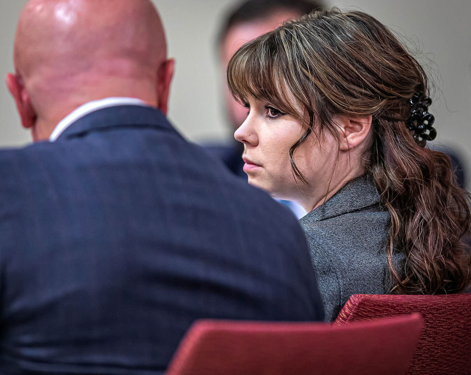 Rust film set armorer Hannah Gutierrez-Reed confers with her attorney Jason Bowles during opening arguments in Judge Mary Marlowe Sommer's courtroom at the First Judicial District Courthouse in Santa Fe, New Mexico, U.S. February 22, 2024. 
