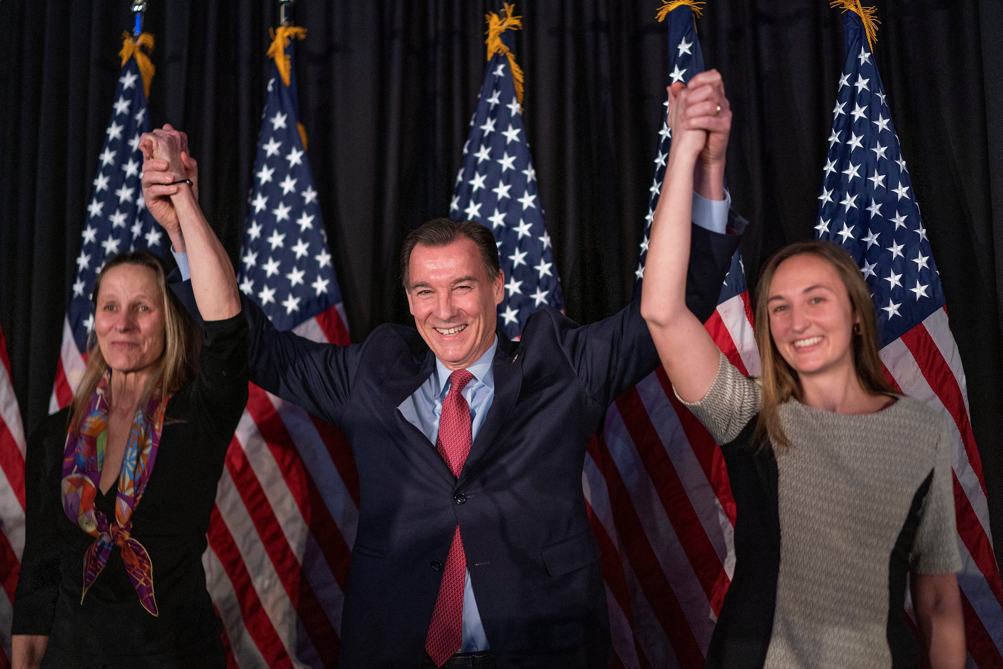 Democratic congressional candidate for New York's 3rd district, Tom Suozzi, celebrates with his family during his election night party, following a special election to fill the vacancy created by Republican George Santos' ouster from Congress, in Woodbury, New York, U.S., February 13, 2024. 
