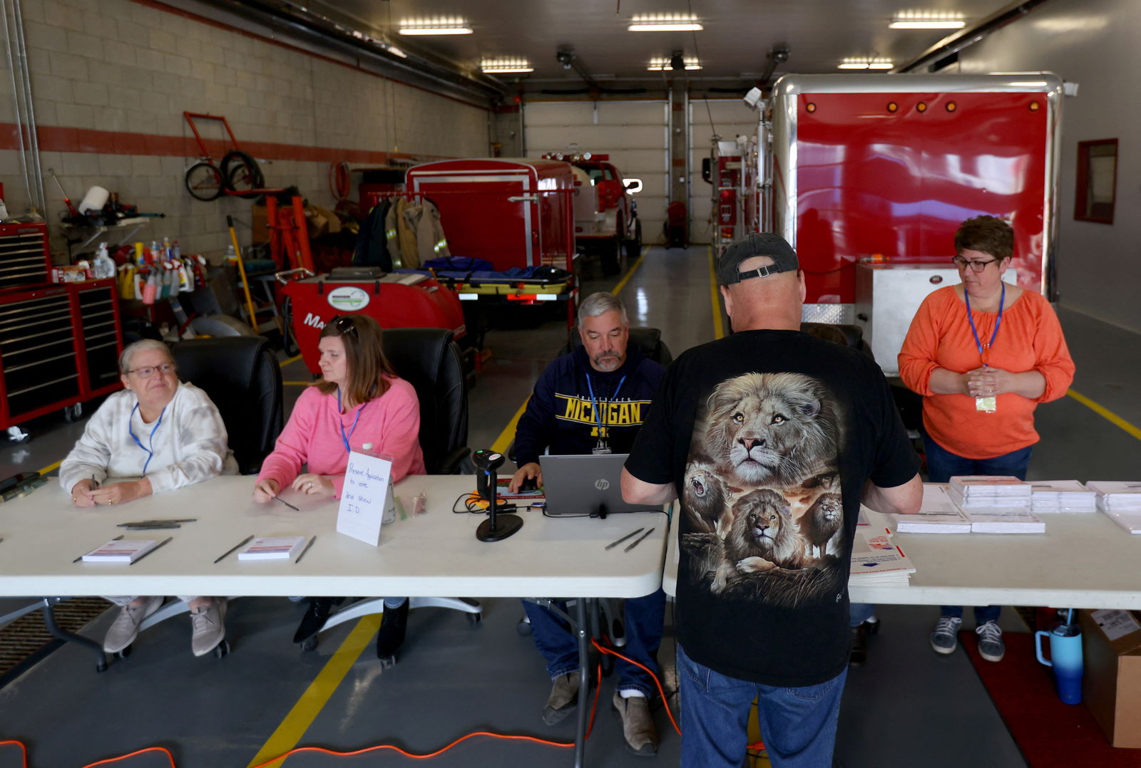 A man votes, as Democrats and Republicans hold their Michigan primary presidential election, at the Sunfield Fire Barn in Sunfield, Michigan, U.S. February 27, 2024. 
