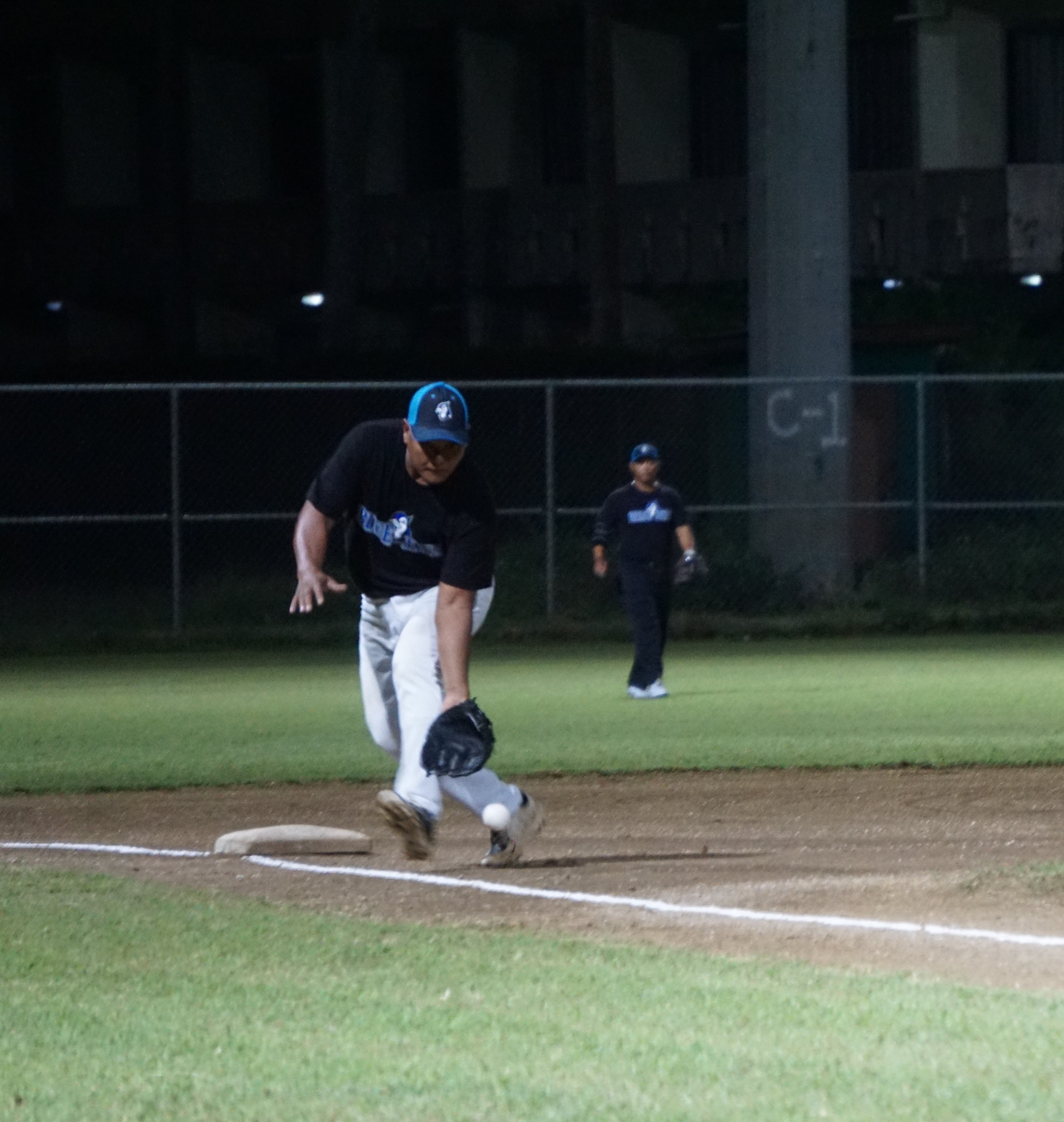 Blue Jays third baseman Manny Cabrera reaches to secure a grounder during an SBL Masters League game at the Francisco "Tan Ko" Palacios Baseball Field. 
