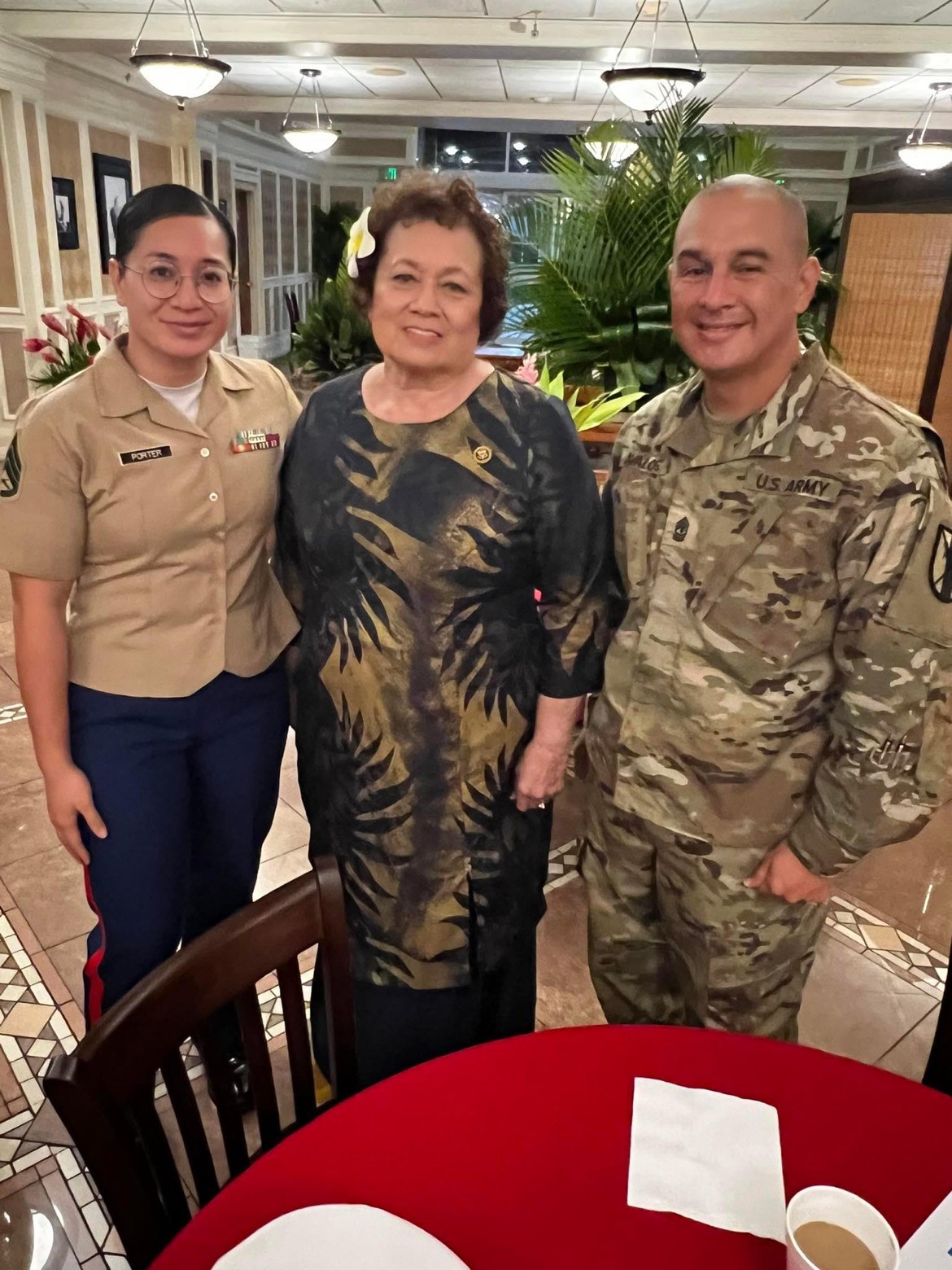 Amata with SSgt Helenia Porter, U.S. Marine Corps recruiter, and 1st Sgt. Avalos, U.S. Army.