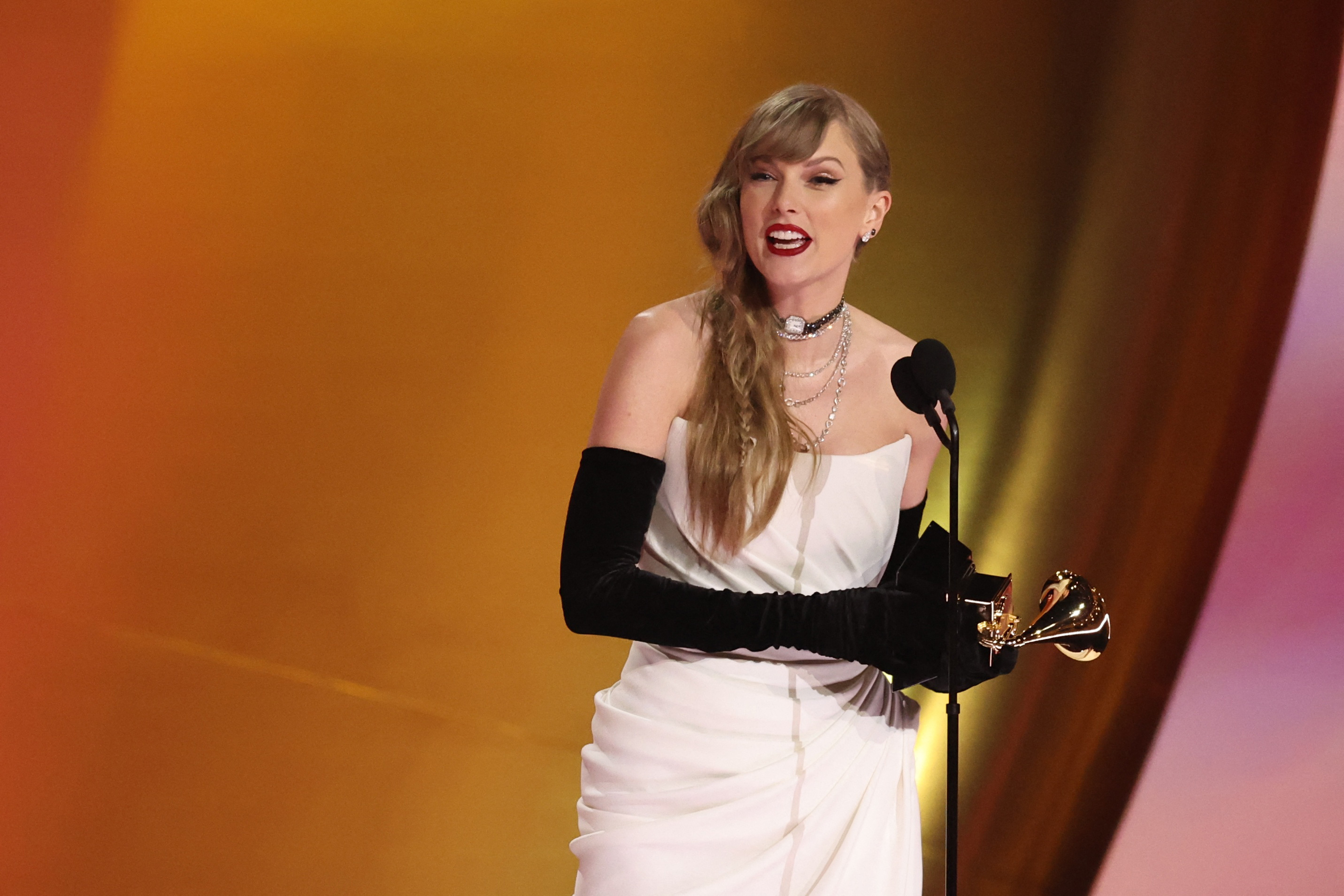 Taylor Swift accepts the award for Album of the Year for Midnights during the 66th Annual Grammy Awards in Los Angeles, California, Feb. 4, 2024.