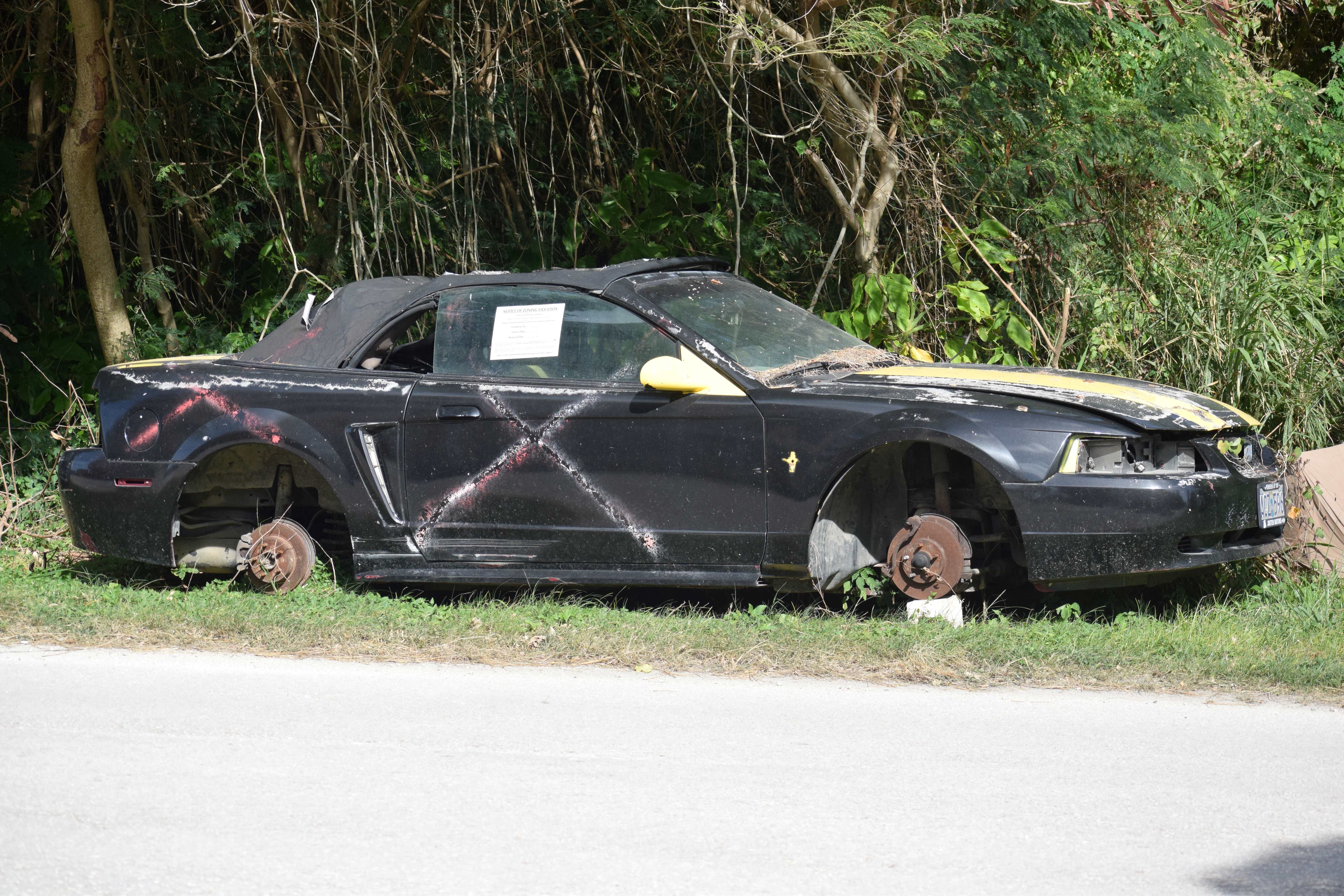 A junk car in Garapan.