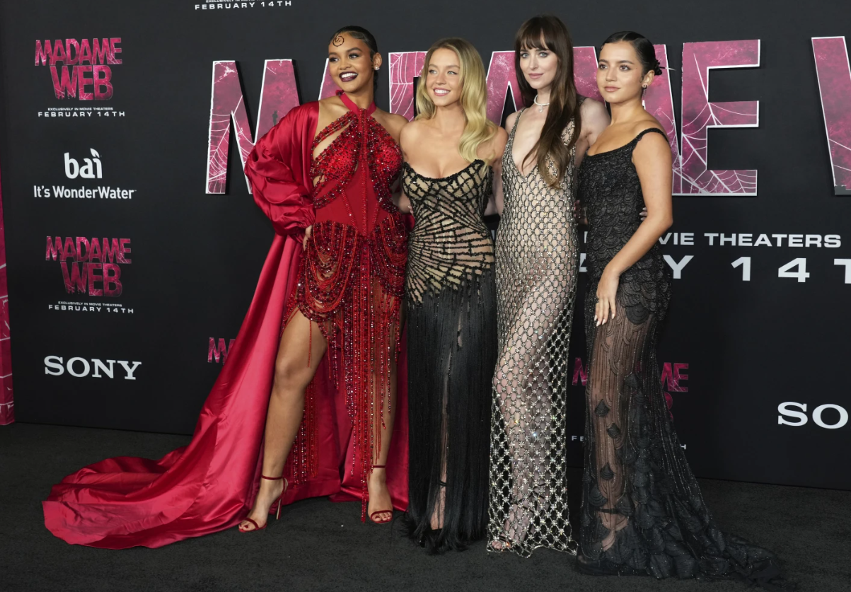 Celeste O’Connor, from left, Sydney Sweeney, Dakota Johnson and Isabela Merced arrive at the premiere of “Madame Web,” Monday, Feb. 12, 2024 at the Regency Village Theatre in Los Angeles.