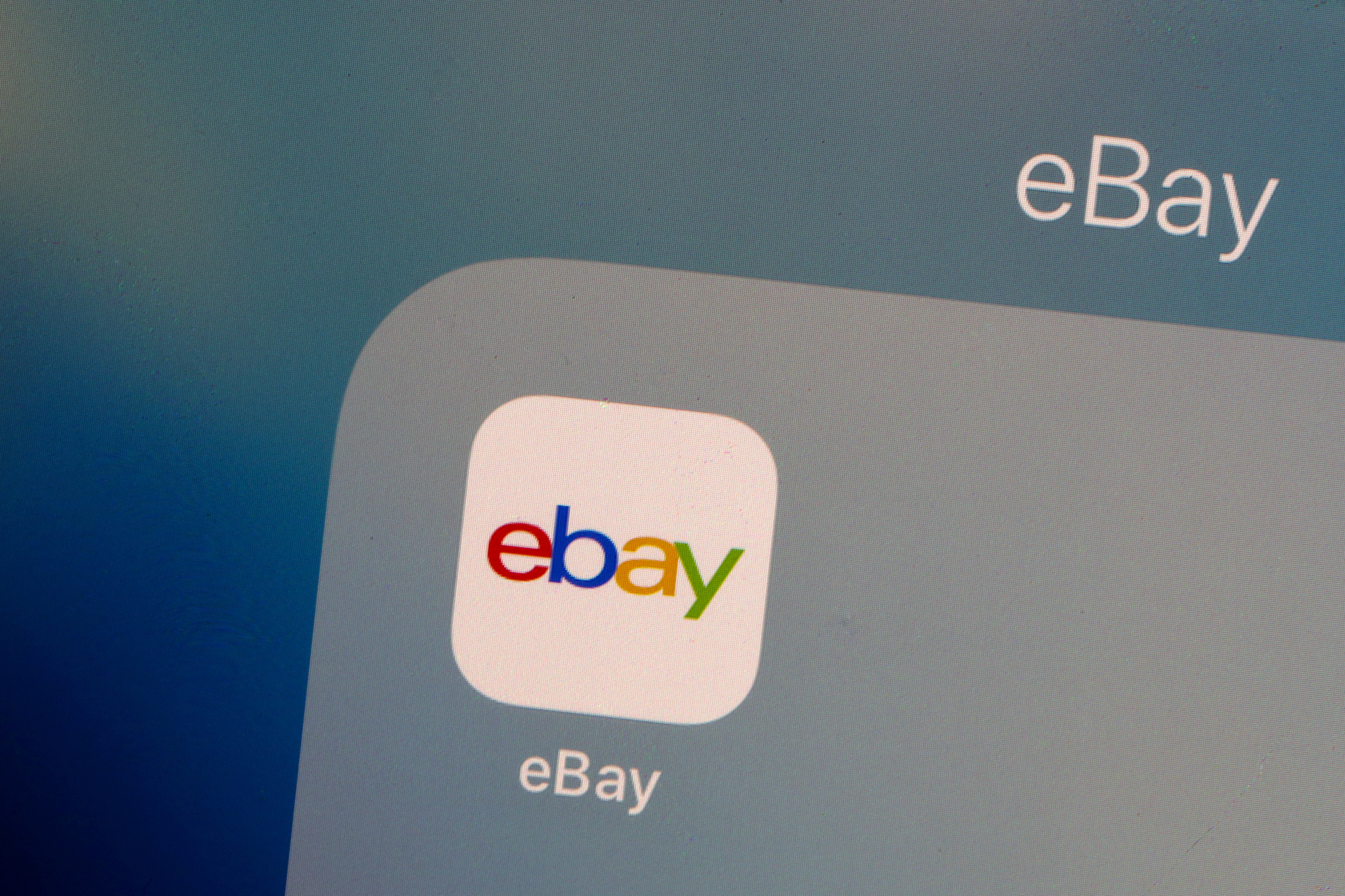 The eBay logo is pictured on a phone screen in this photo illustration in New York, U.S., July 23, 2019. 