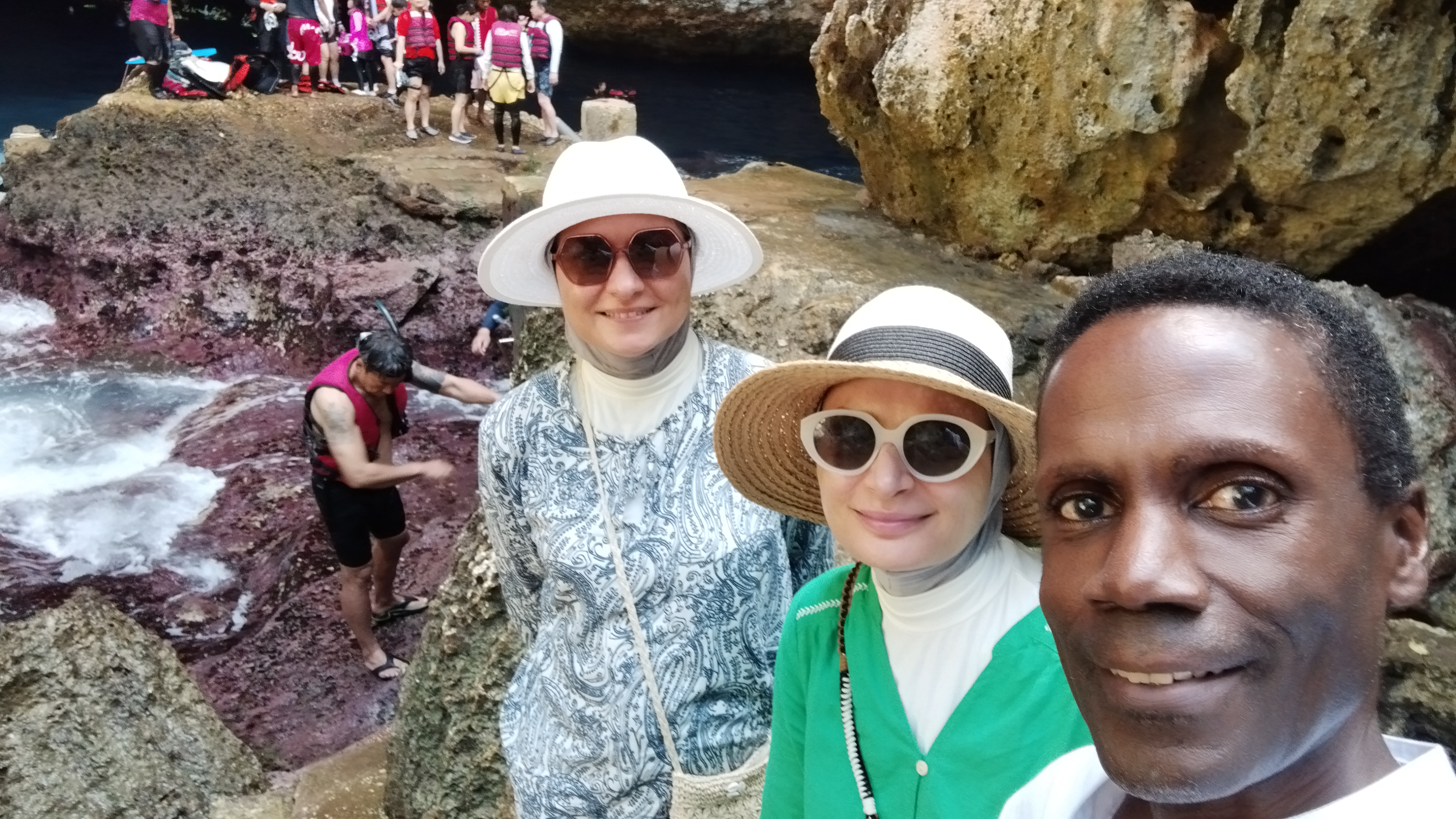 Kuwaiti tourists Wesam and sister Weam Behbehani with author Walt Goodridge at the Grotto.
