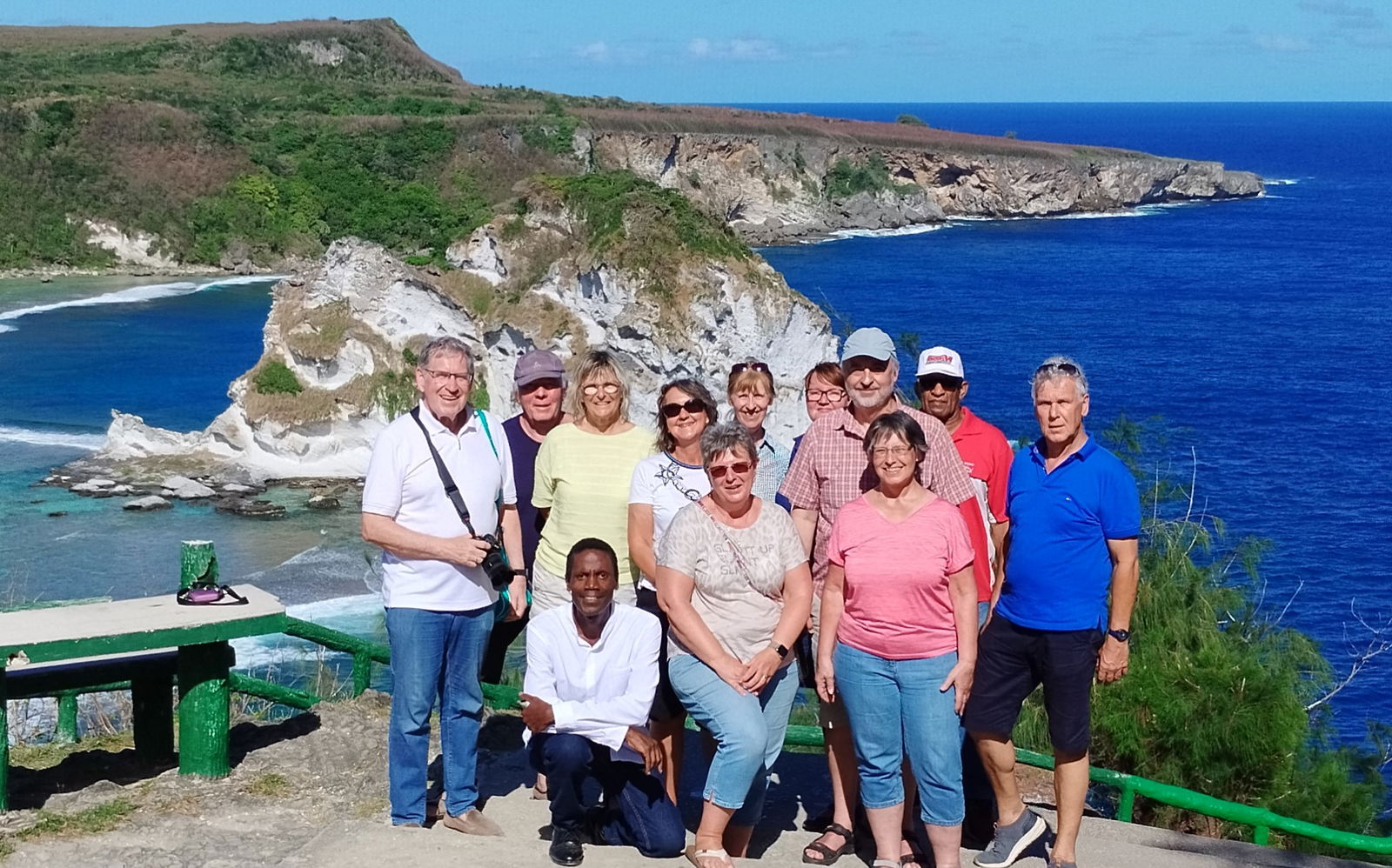 German tourists from the MS Artania cruise ship — seen here at the Bird Island lookout — experience the beauty of Saipan during their 10-hour shore excursion guided by author Walt Goodridge and local resident Willy Kaitabu, 2nd from left.