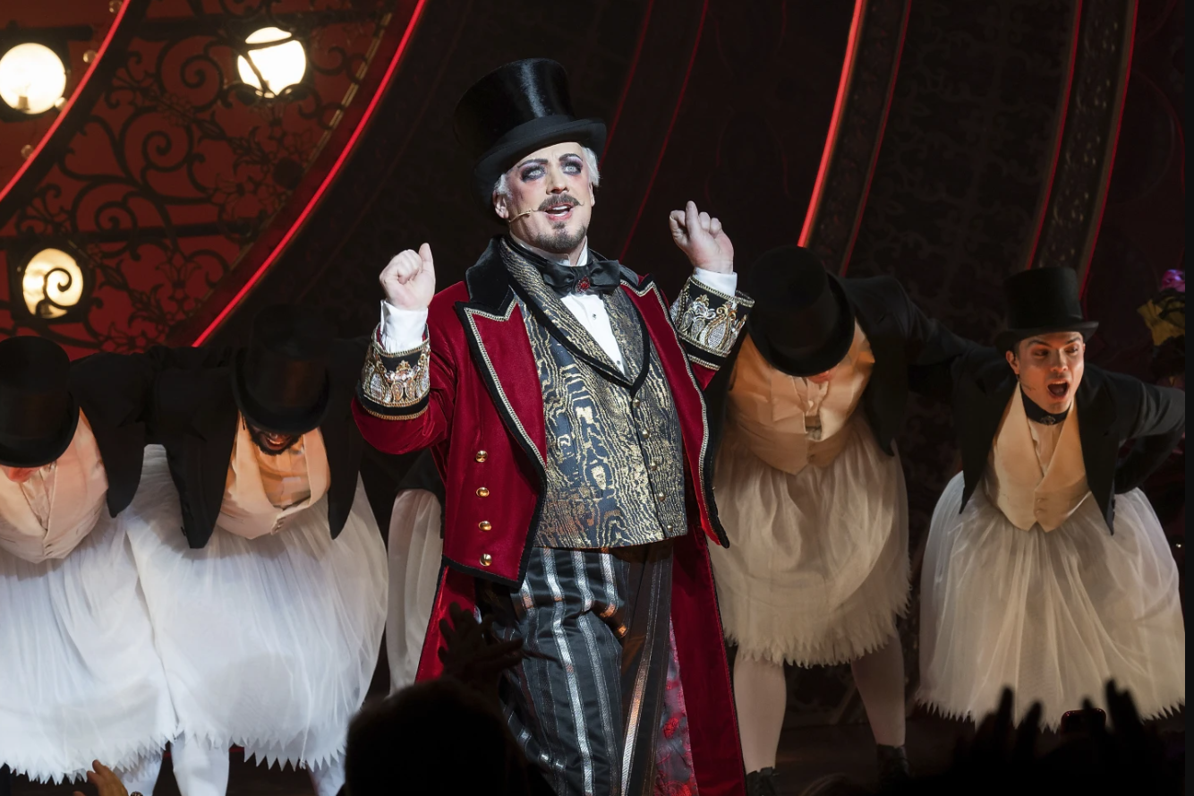 Boy George, center, on stage during the curtain call for his debut performance in “Moulin Rouge! The Musical” at the Al Hirschfeld Theatre on Tuesday, Feb. 6, 2024 in New York.