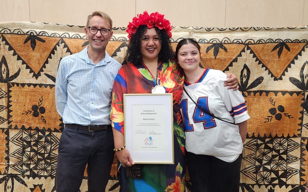 Maria Pasene, who was the coordinator for the Covid-19 response for Pacific communities in Christchurch, stands with former New Zealand Director-General of Health Sir Ashley Bloomfield and her daughter Oriana Pasene. 
