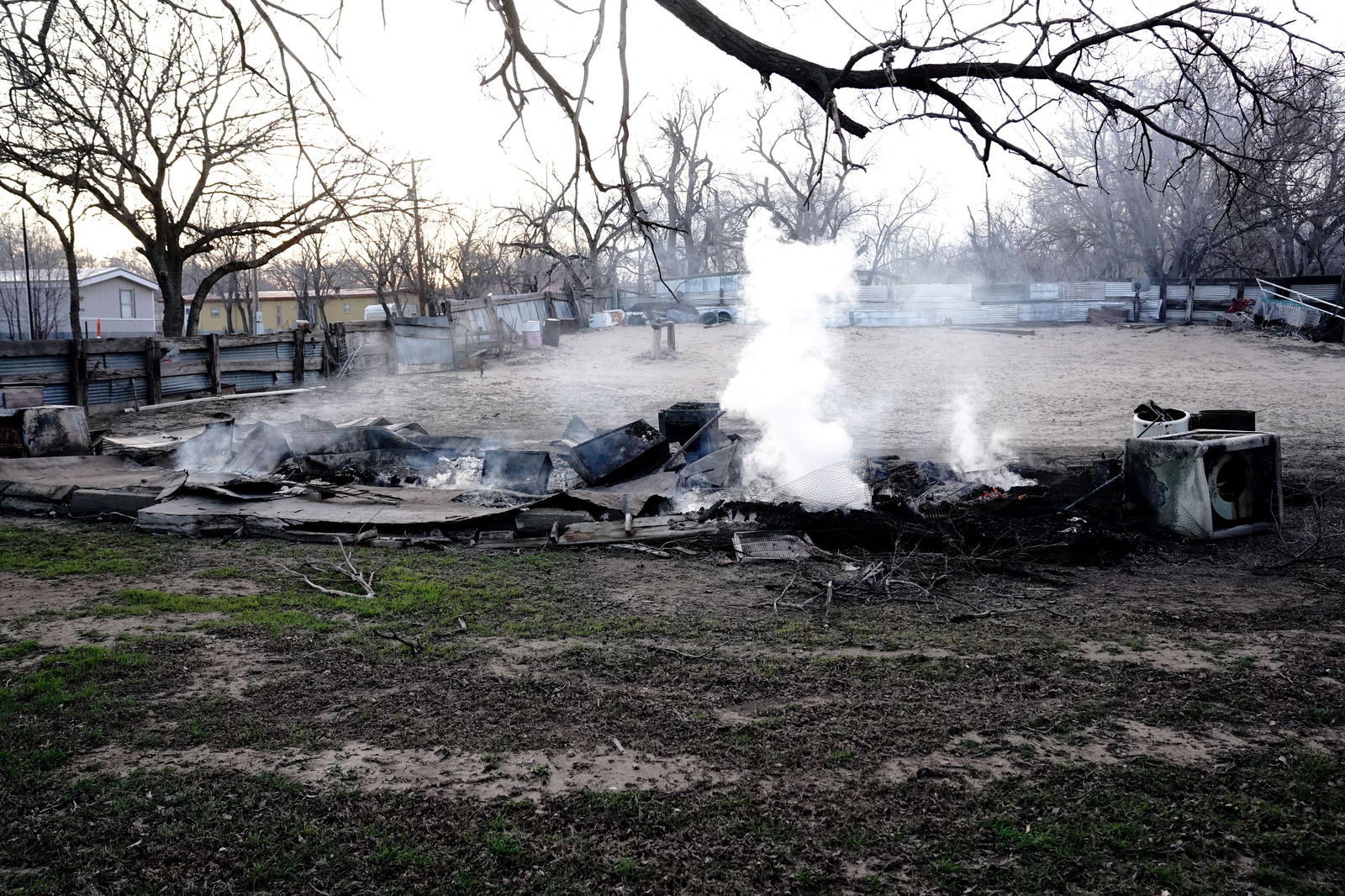 Remains of a home that was burned by the Smokehouse Creek wildfire smolder in Canadian, Texas, U.S. February 28, 2024. 