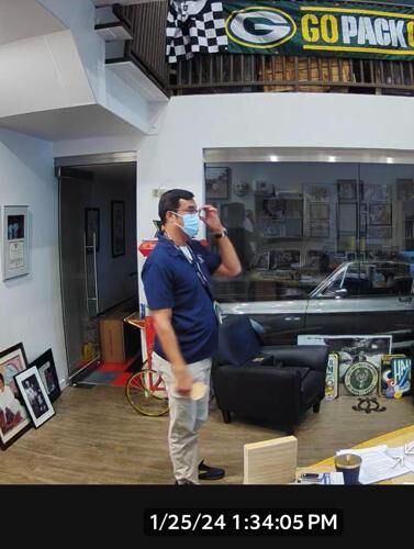 Guam Memorial Hospital chief pharmacist Jason Boyd is depicted in surveillance footage from Dr. Thomas Shieh’s office on Jan. 25, 2024. 