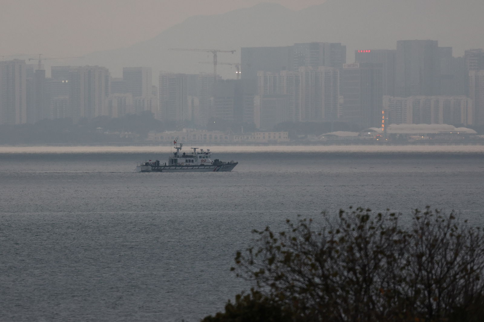 A fishing boat can be seen between Kinmen and Xiamen in China in Kinemn, Taiwan February 20, 2024. 