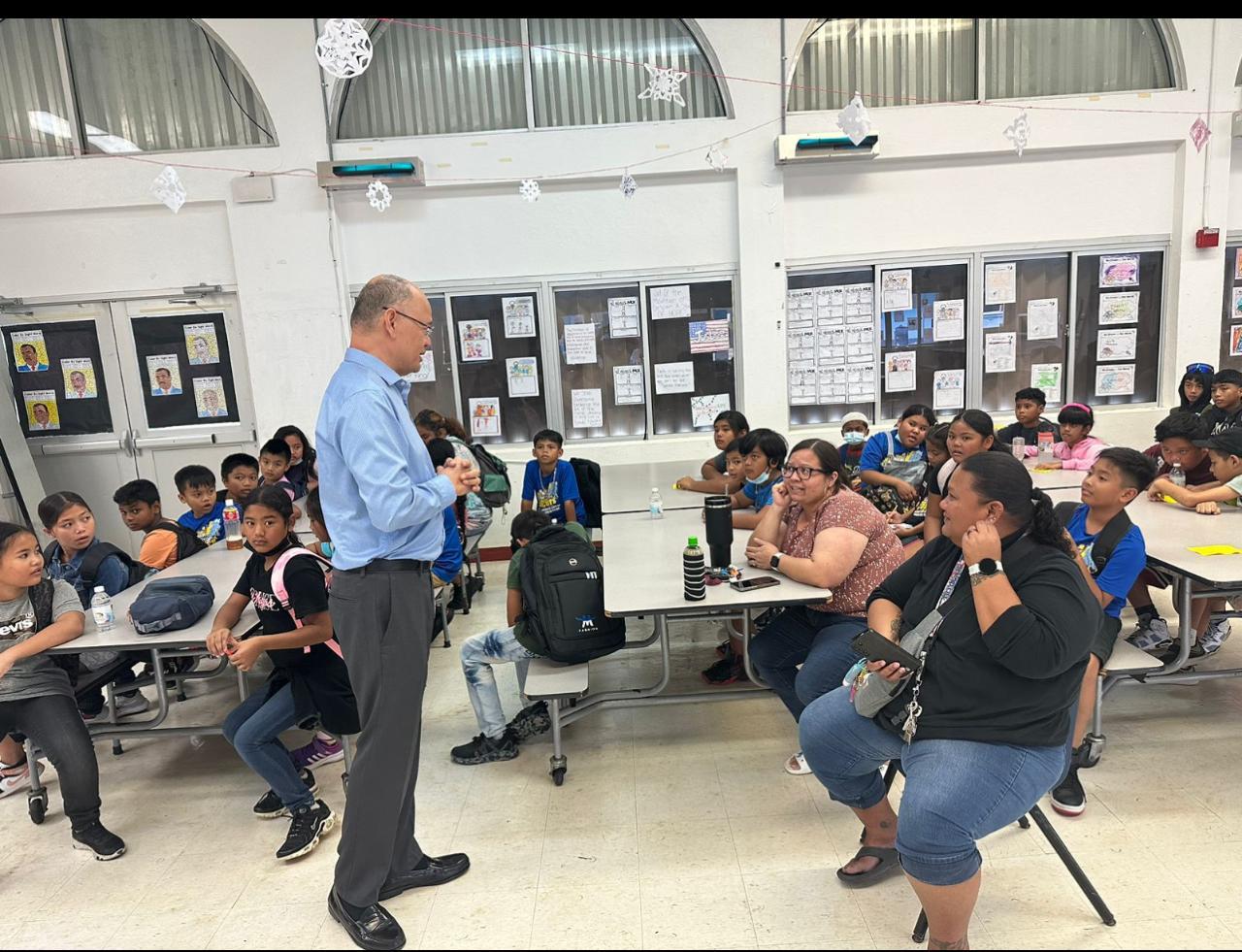 Justice John A. Manglona answers students’ questions at Tinian Elementary School.