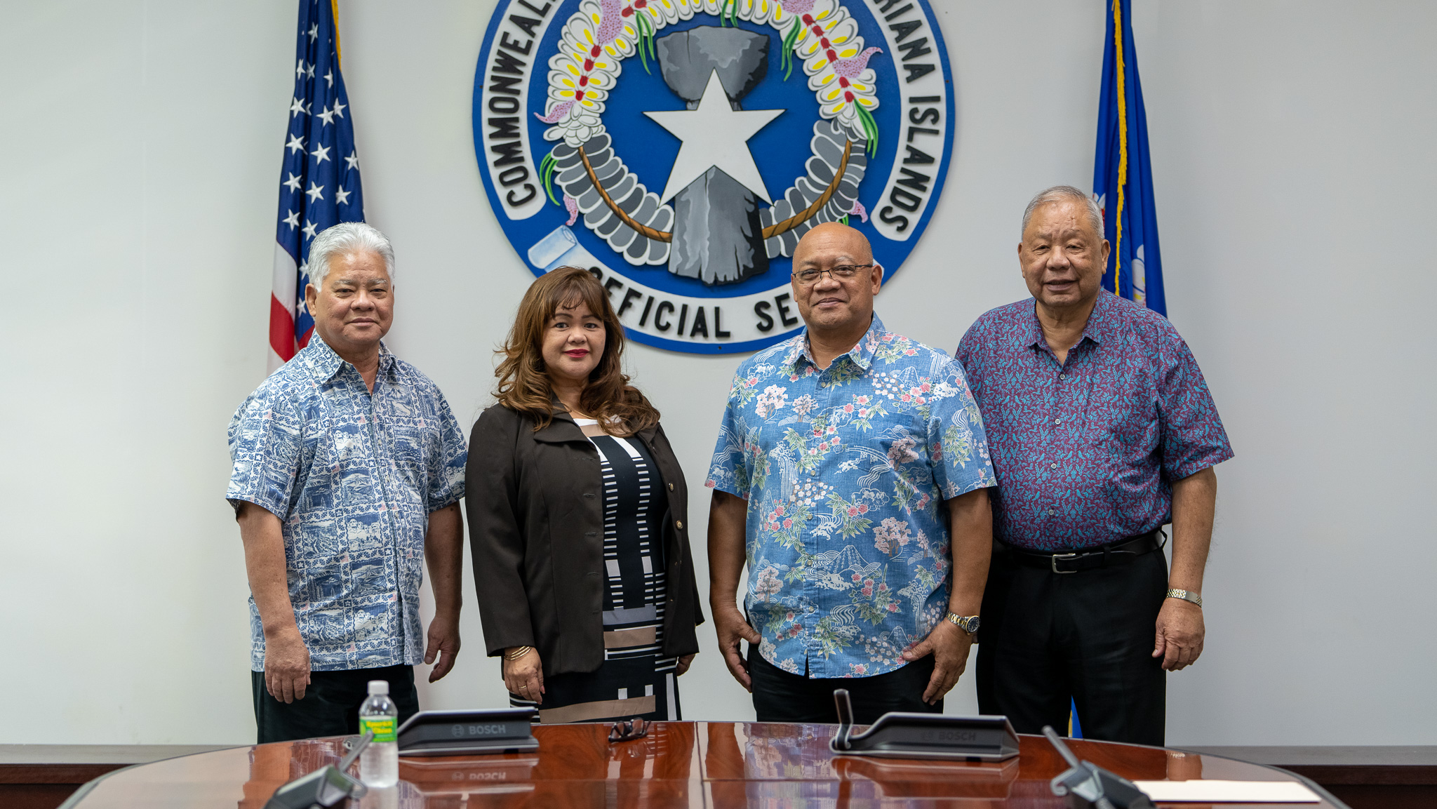 Gov. Arnold I. Palacios, left, and Lt. Gov. David M. Apatang, right, pose for a photo with new Zoning Board members Charlotte Cepeda, 2nd left, and Stephen P. Sablan following their swearing-in ceremony in the governor's conference room on Wednesday.