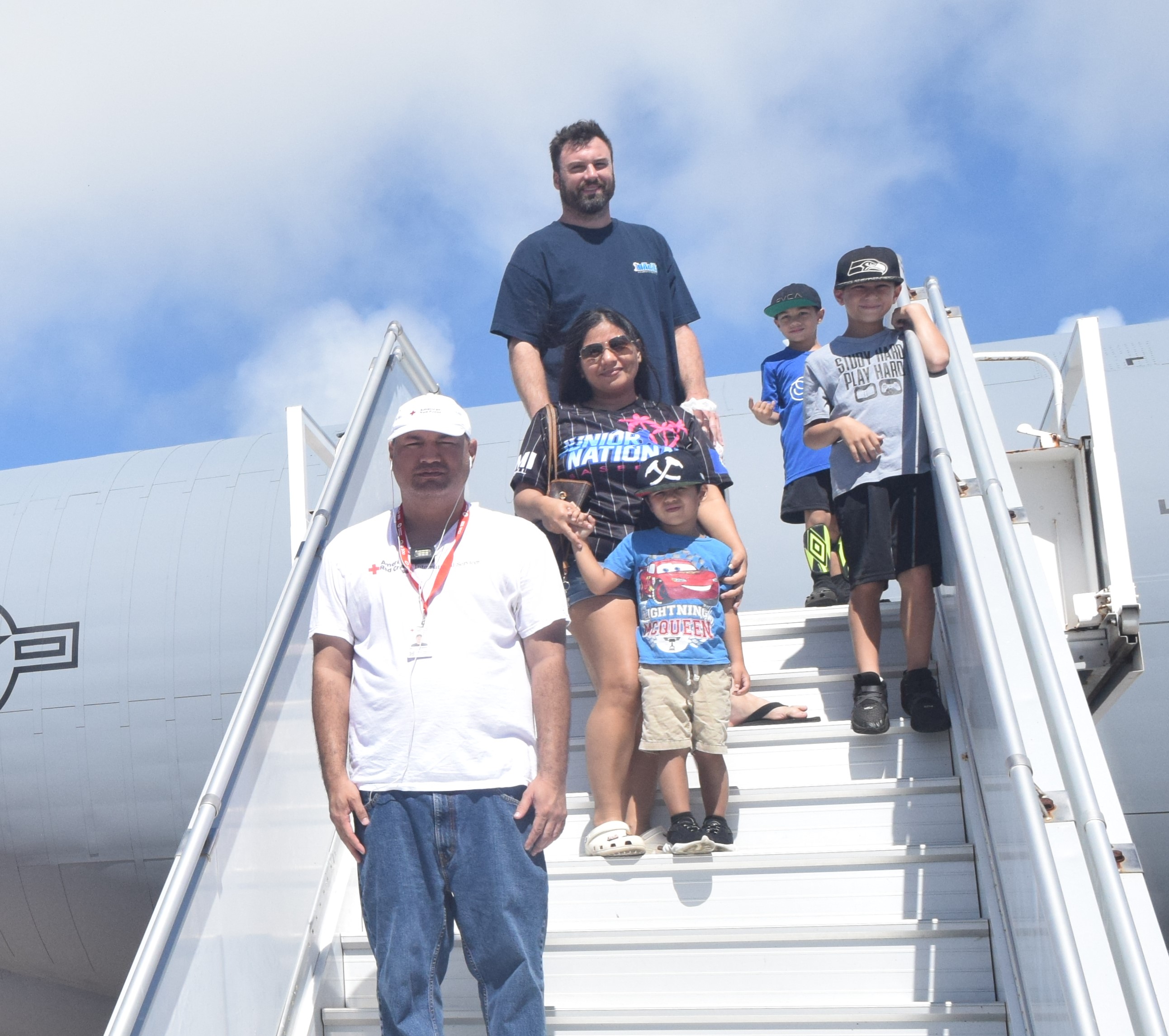 Alex Standish, top, with wife Martha, their children Madex, Deion and Milo with American Red Cross-NMI Chapter disaster service staff member Luis Sablan Crisostimo Jr.