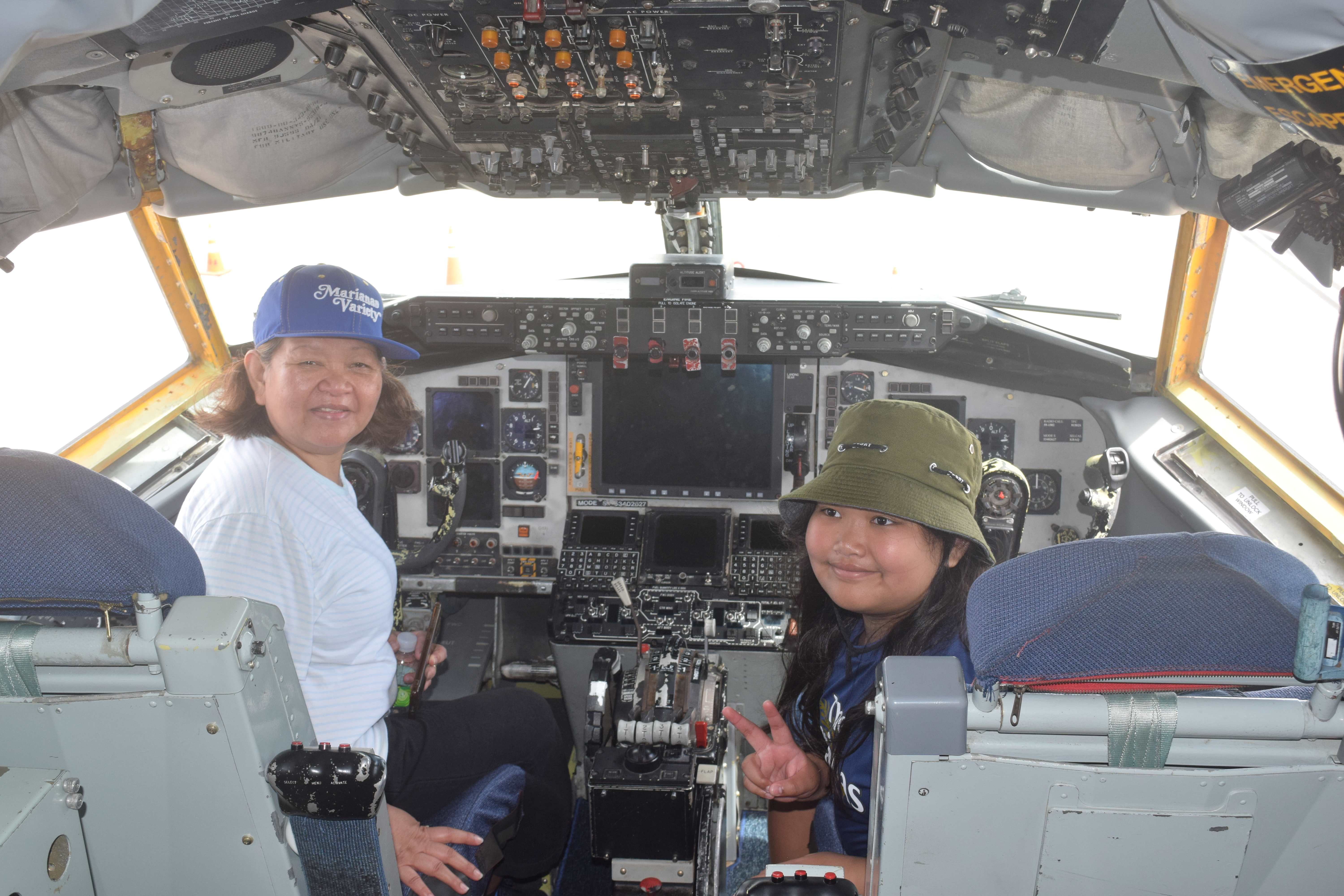 Marianas Variety's Jeanette Sarabia and daughter Johana pose for a photo in the cockpit of a KC-135 air-to-air refueling aircraft.