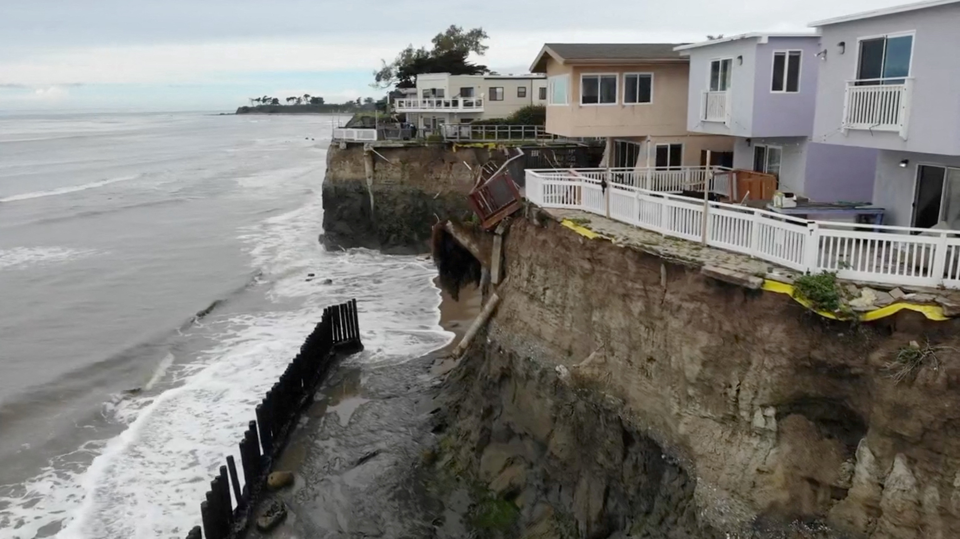 Parts of a cliff erodes in Santa Barbara, California, U.S. in this screengrab taken from a handout video released on February 6, 2024. 