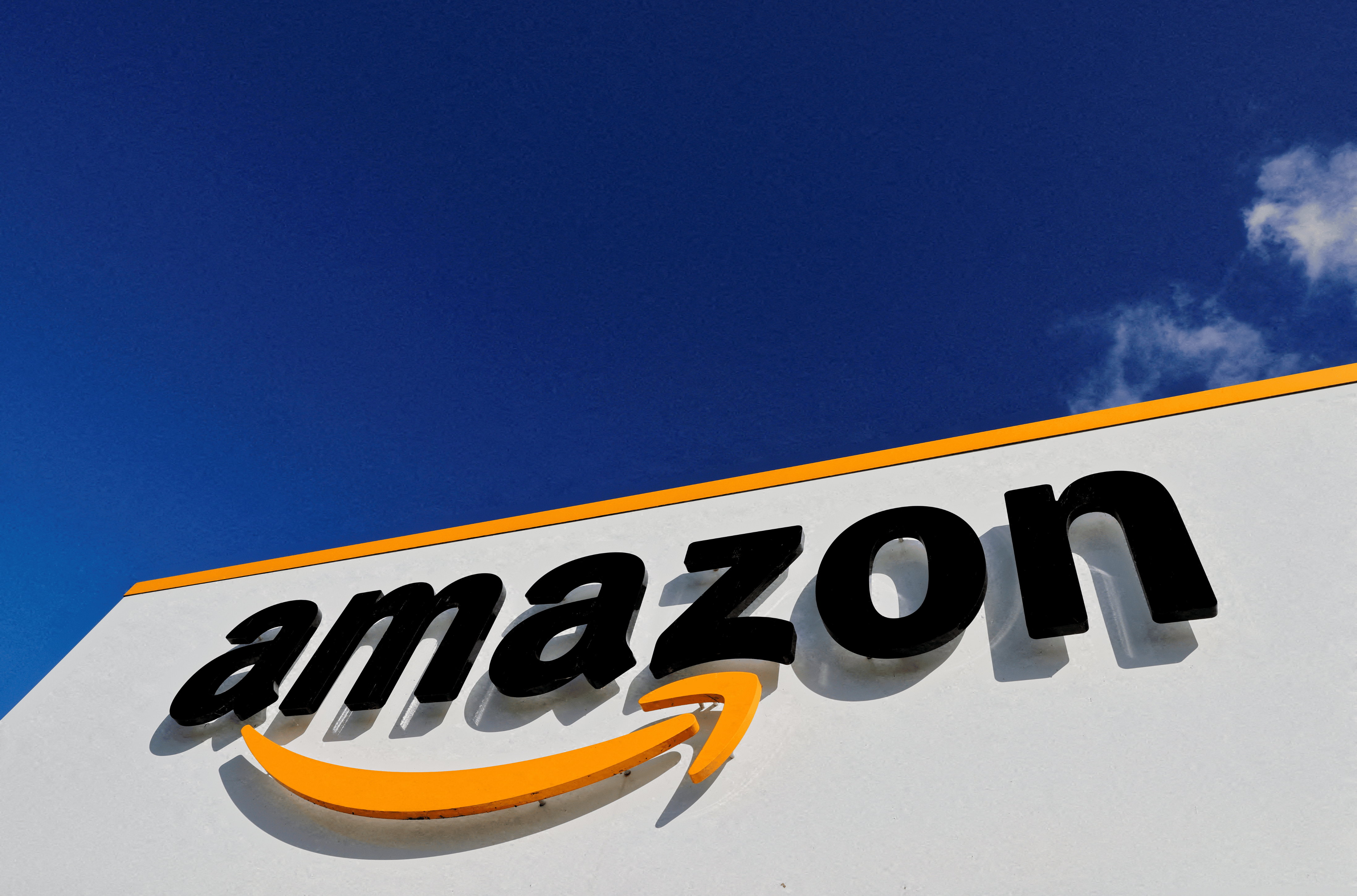 The logo of Amazon is seen at the company's logistics centre in Boves, France, October 6, 2021 