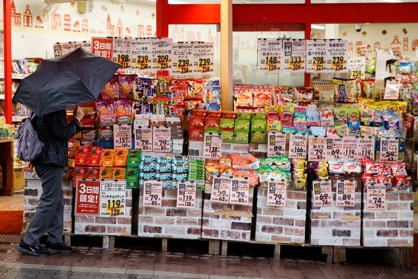 A woman looks at items at a shop in Tokyo, Japan, March 24, 2023. 