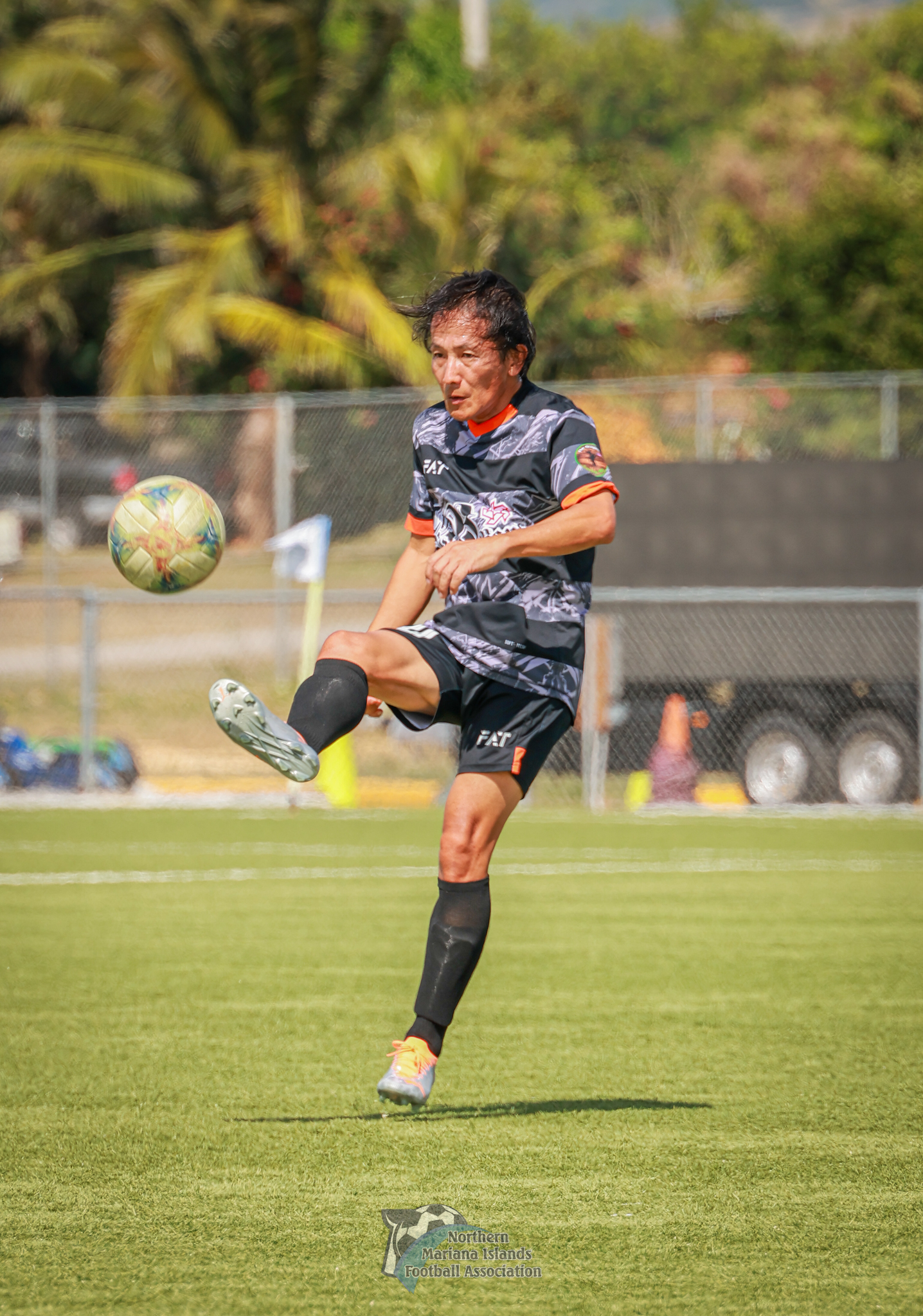 Old B Bank's Kosuke Sato passes to a teammate during an opening game of the Marianas Soccer League 2 at the NMI Soccer Training Center in Koblerville in Sunday, Feb 11, 2024.