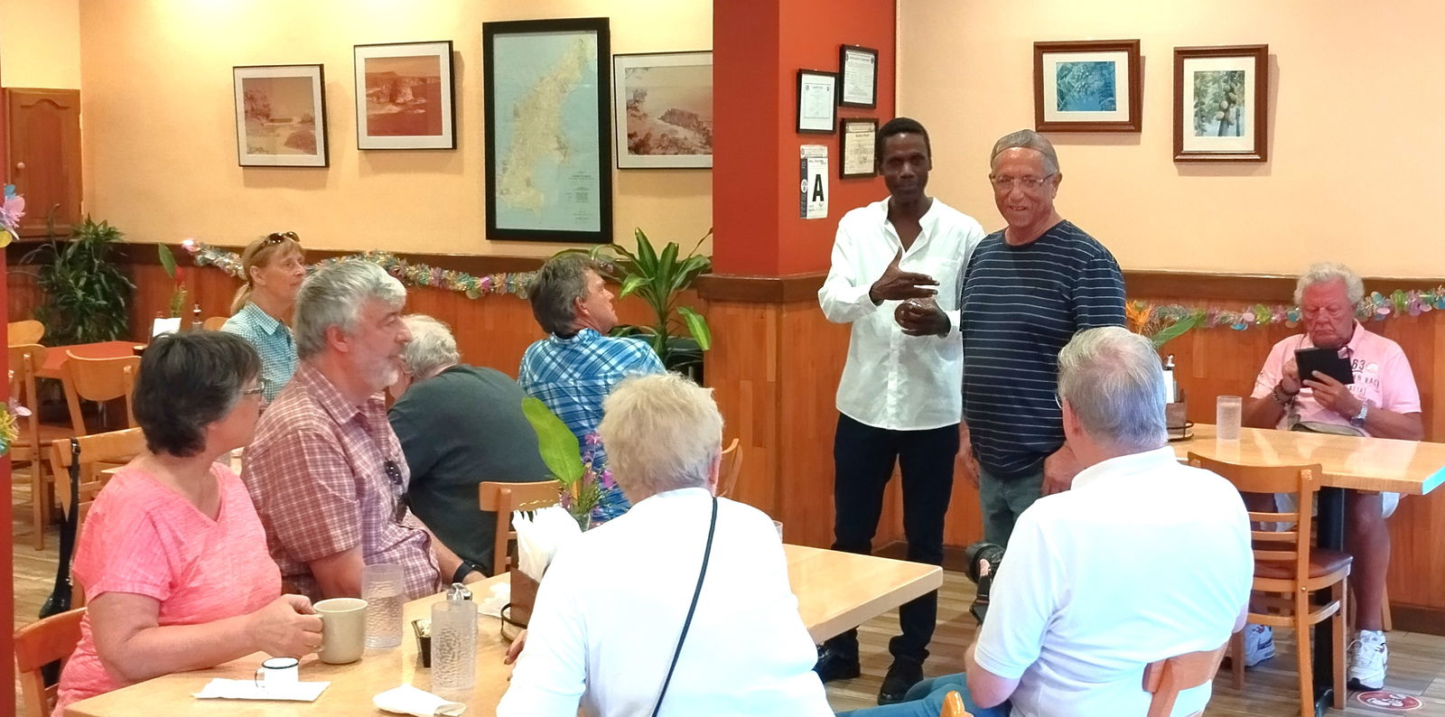 MS Artania guests meet and ask questions of Lee "Pan" Guerrero at Herman's.