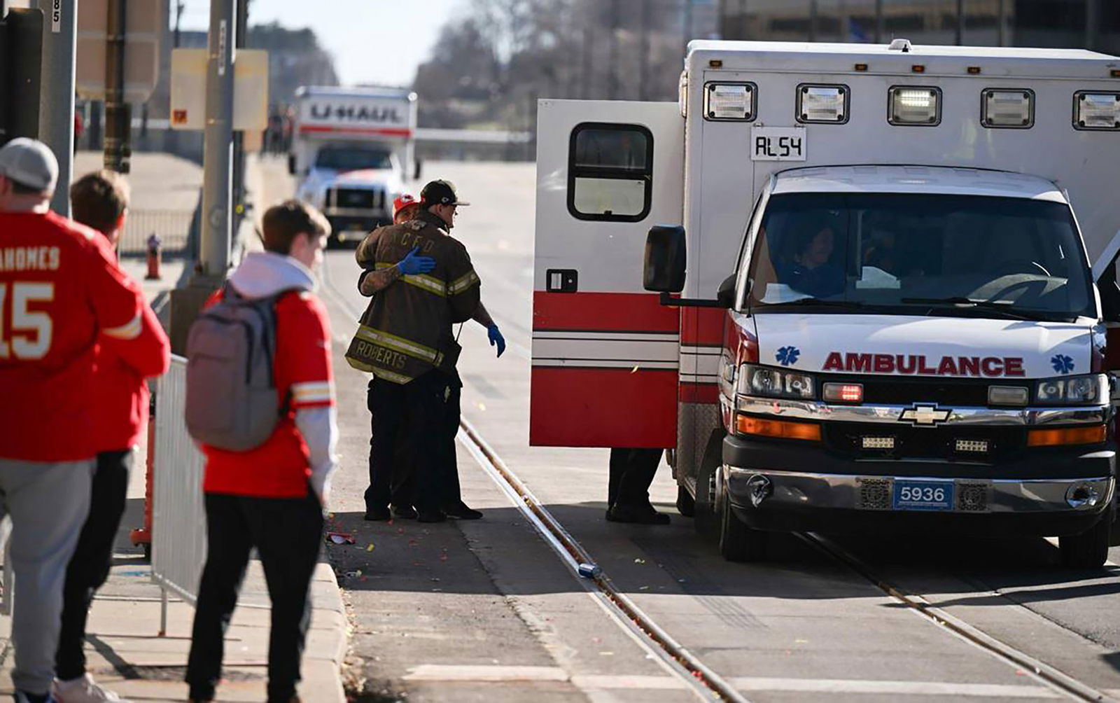 A firefighter waits outside an ambulance near Union Station after several were people were shot near a rally there during the Kansas City Chiefs' Super Bowl LVIII victory parade on Feb. 14, 2024, in Kansas City, Missouri. (Emily Curiel/The Kansas City Star/TNS)