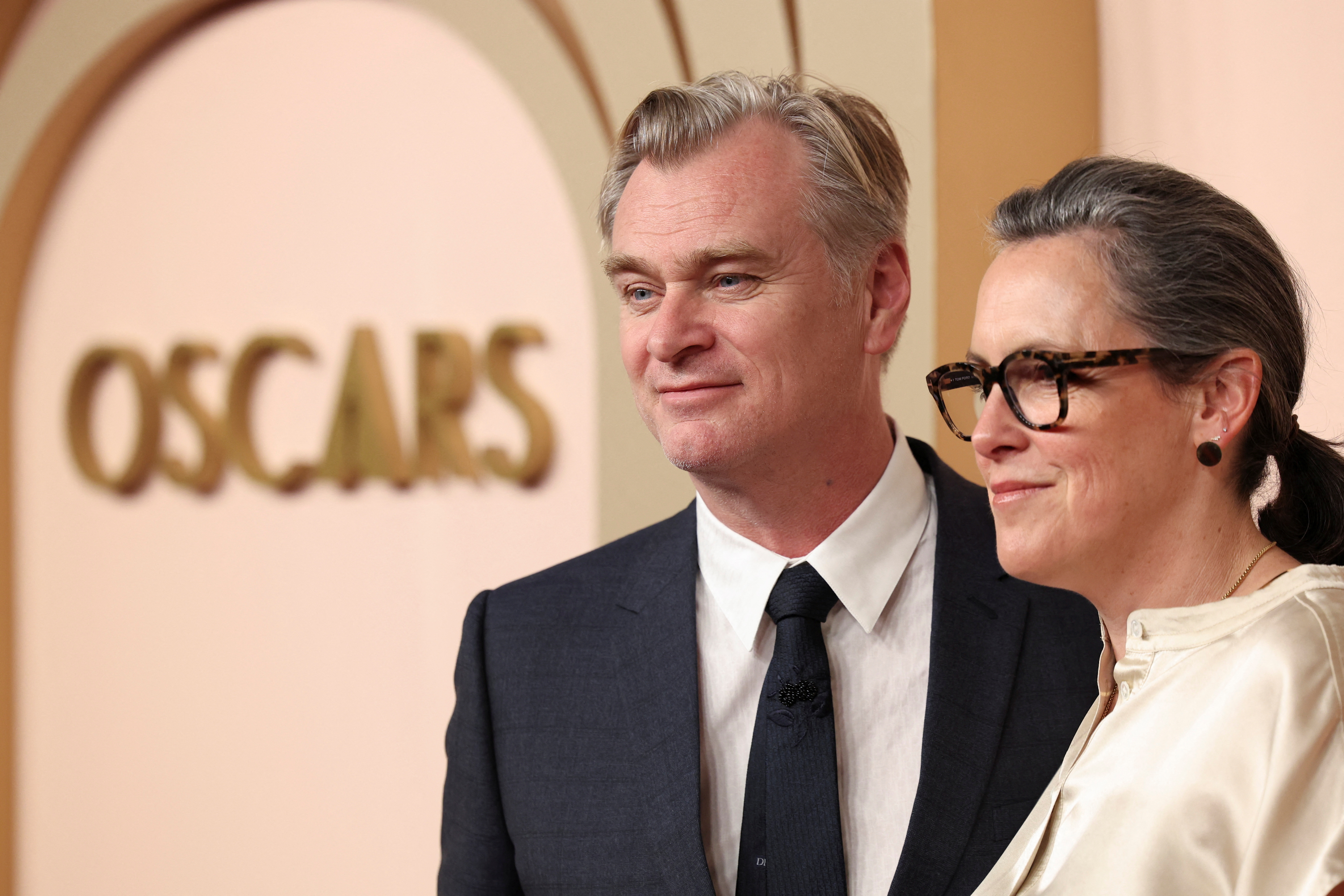 Christopher Nolan, nominated for Best Director for "Oppenheimer" which is also nominated for Best Adapted Screenplay and Best Picture, and his wife Emma Thomas, producer of "Oppenheimer", attend the Nominees Luncheon for the 96th Oscars in Beverly Hills, California, U.S. February 12, 2024. 