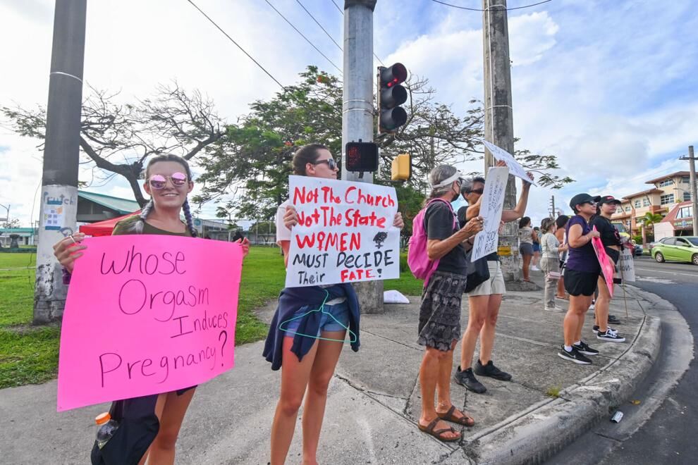 Dozens of people came out to support abortion rights in the Rally for Roe, July 6, 2022, at the ITC intersection in Tamuning. 