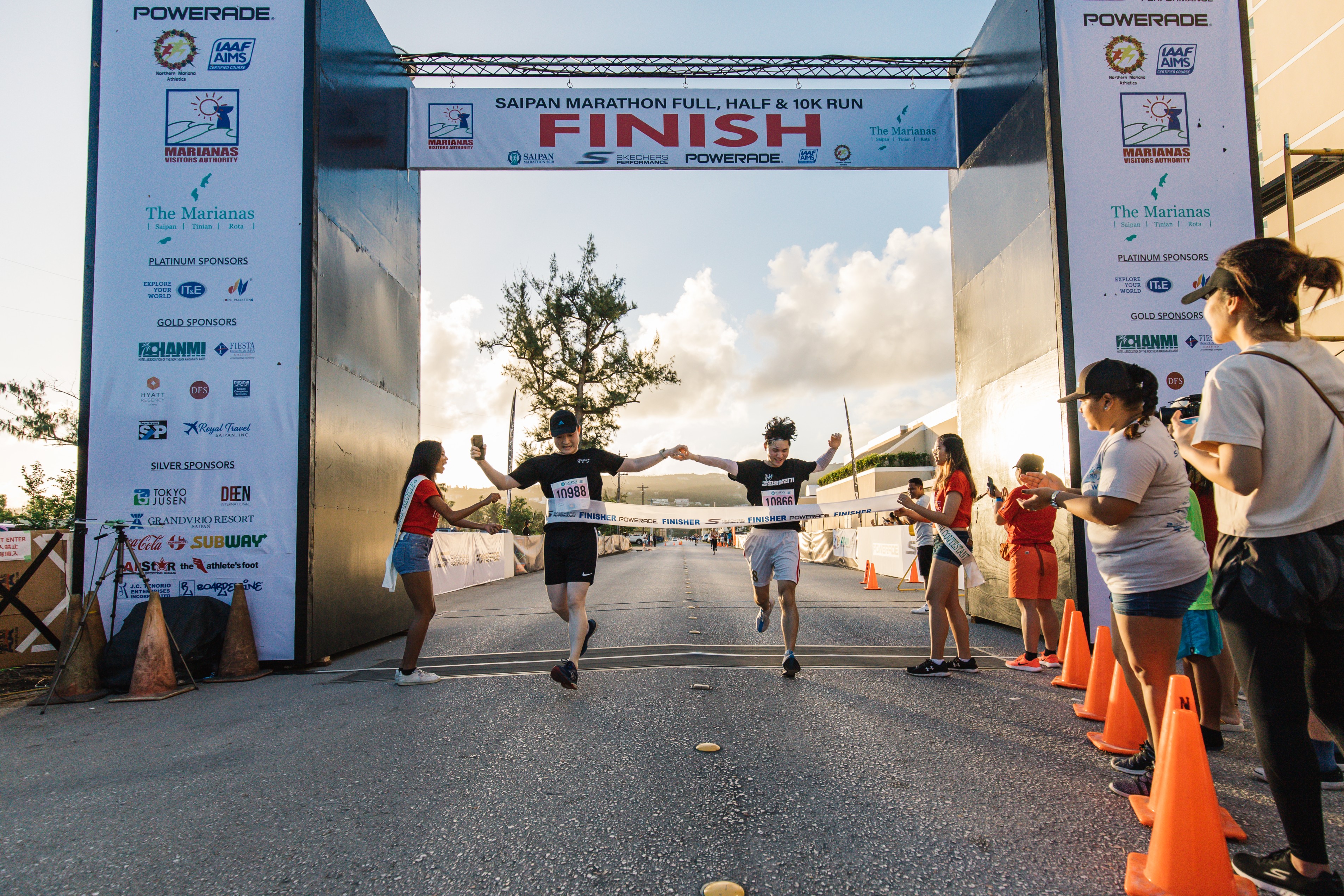 Runners reach the finish line of a previous Saipan Marathon. This year’s event will be held on March 9, 2024 with Platinum Sponsor Coca-Cola, Foremost, and Subway.