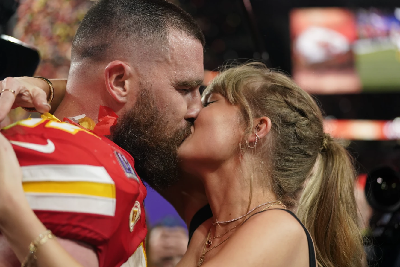 Taylor Swift kisses Travis Kelce of the Kansas City Chiefs after the Super Bowl game, Sunday, Feb. 11, 2024 in Las Vegas. The Chiefs won 25-22 against the 49ers.