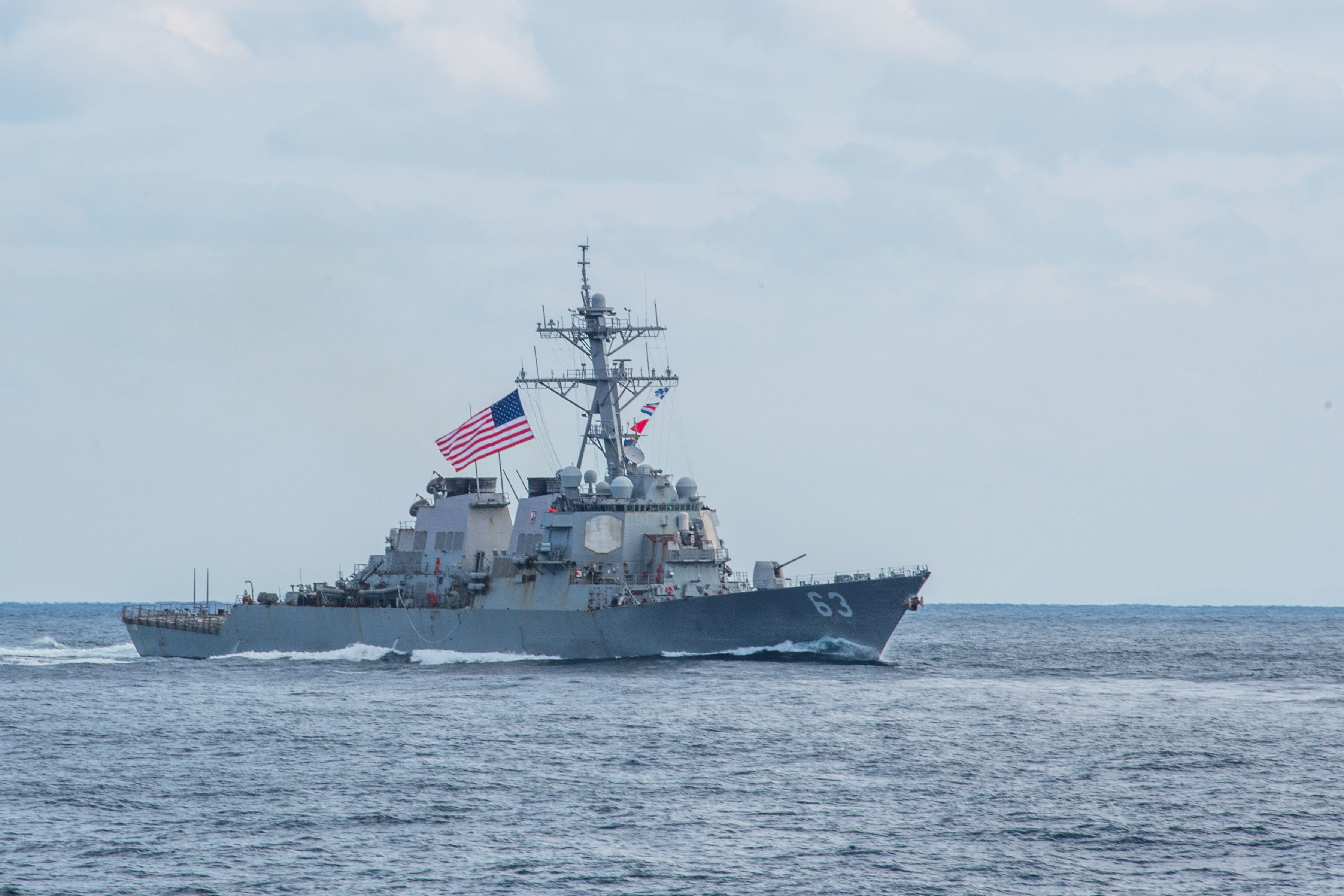 The Arleigh Burke-class guided-missile destroyer USS Stethem (DDG 63) steams during a three-carrier strike force photo exercise in the Western Pacific, November 12, 2017. 