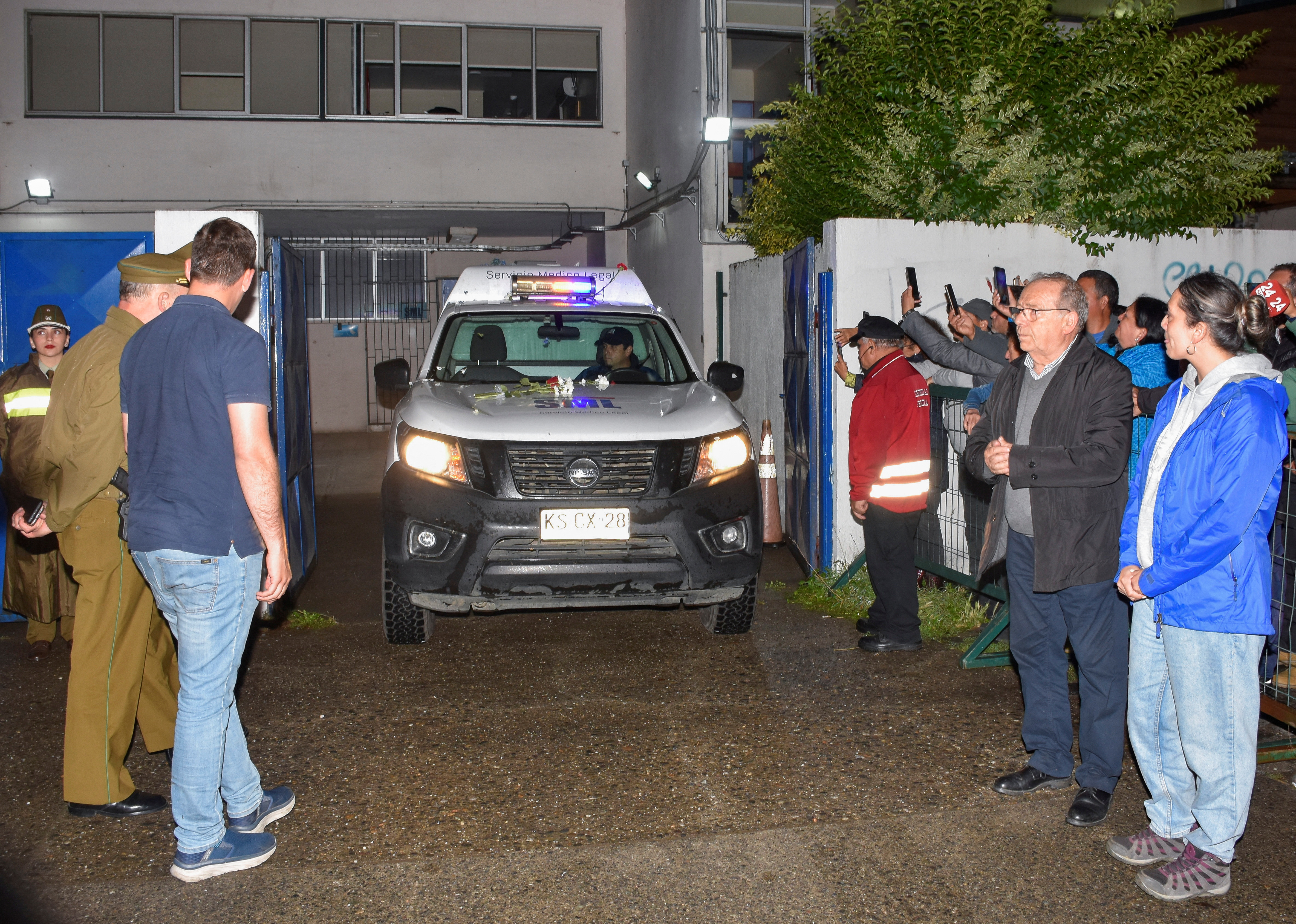 A medical transport vehicle carrying the body of Chile's former President Sebastian Pinera arrives at a medical facility after Pinera died in a helicopter crash, in Valdivia, Chile February 6, 2024. 