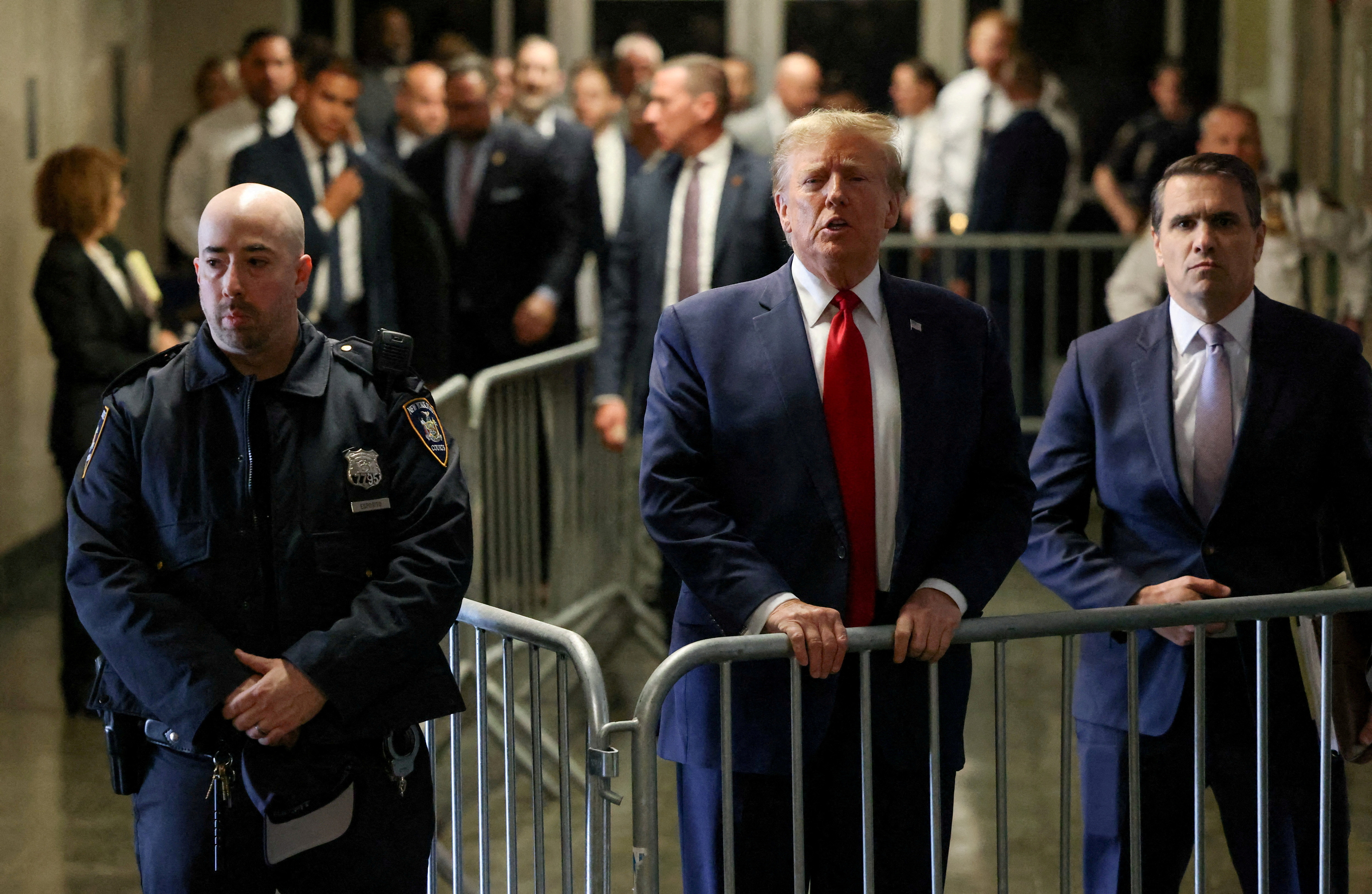 FILE PHOTO: Former U.S. President Donald Trump speaks outside the courtroom on the day of a court hearing on charges of falsifying business records to cover up a hush money payment to a porn star before the 2016 election, in New York State Supreme Court in the Manhattan borough of New York City, U.S., February 15, 2024. 