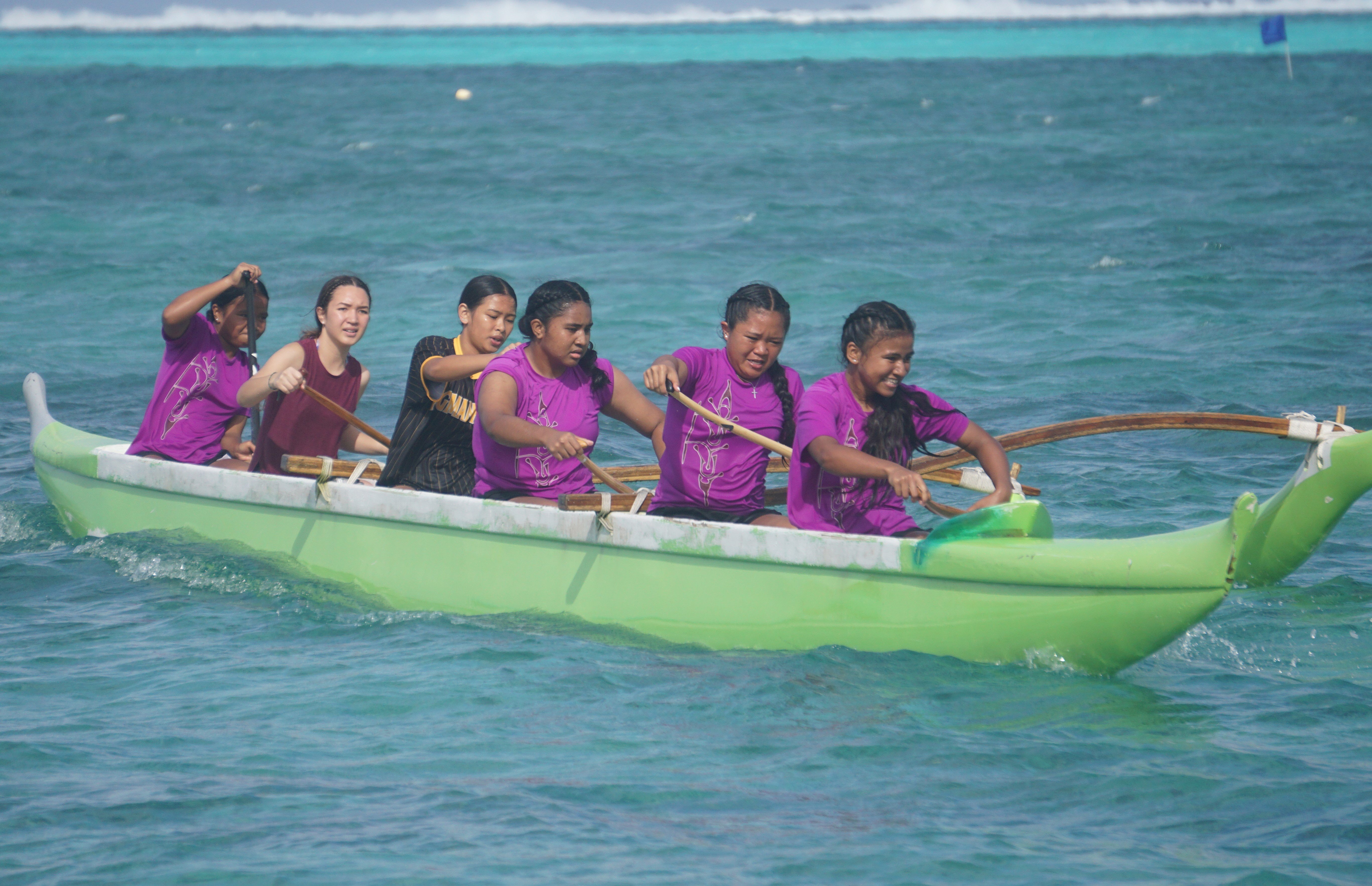 The KHS girls make their way through the first turn in the 1000m event of the co-ed high school division of the PSS Interscholastic Outrigger Race series at Kilili Beach.