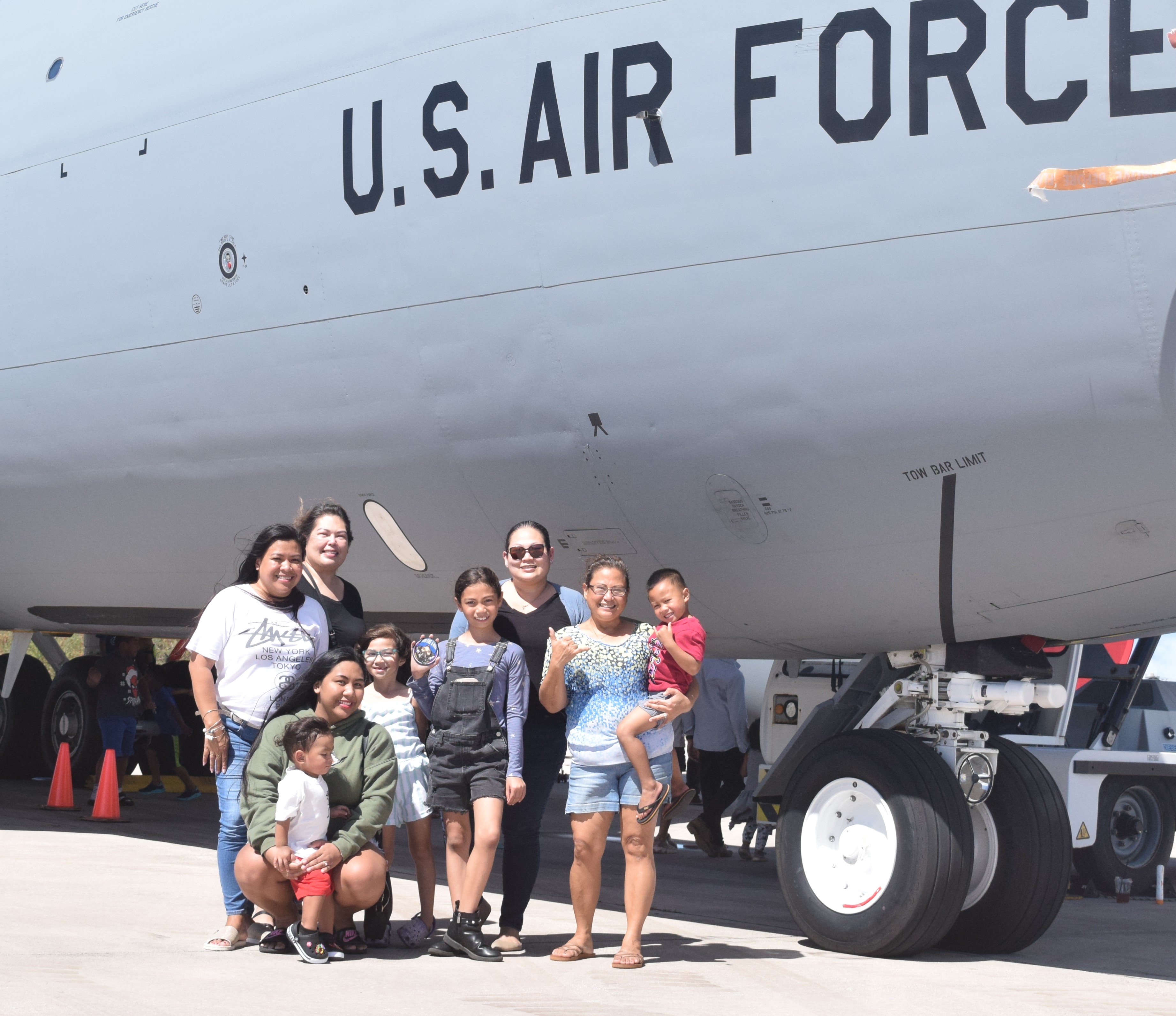Lynette Villagomez, right, with Carter Cervania, poses with family and friends: Jeaniffer Cubangbang, Jewel Cubangbang, Kekoa Cubangbang, Eleminda Cabrera, Yvonne Ogumoro, Amelie Ogumoro and Amara Ogumoro.