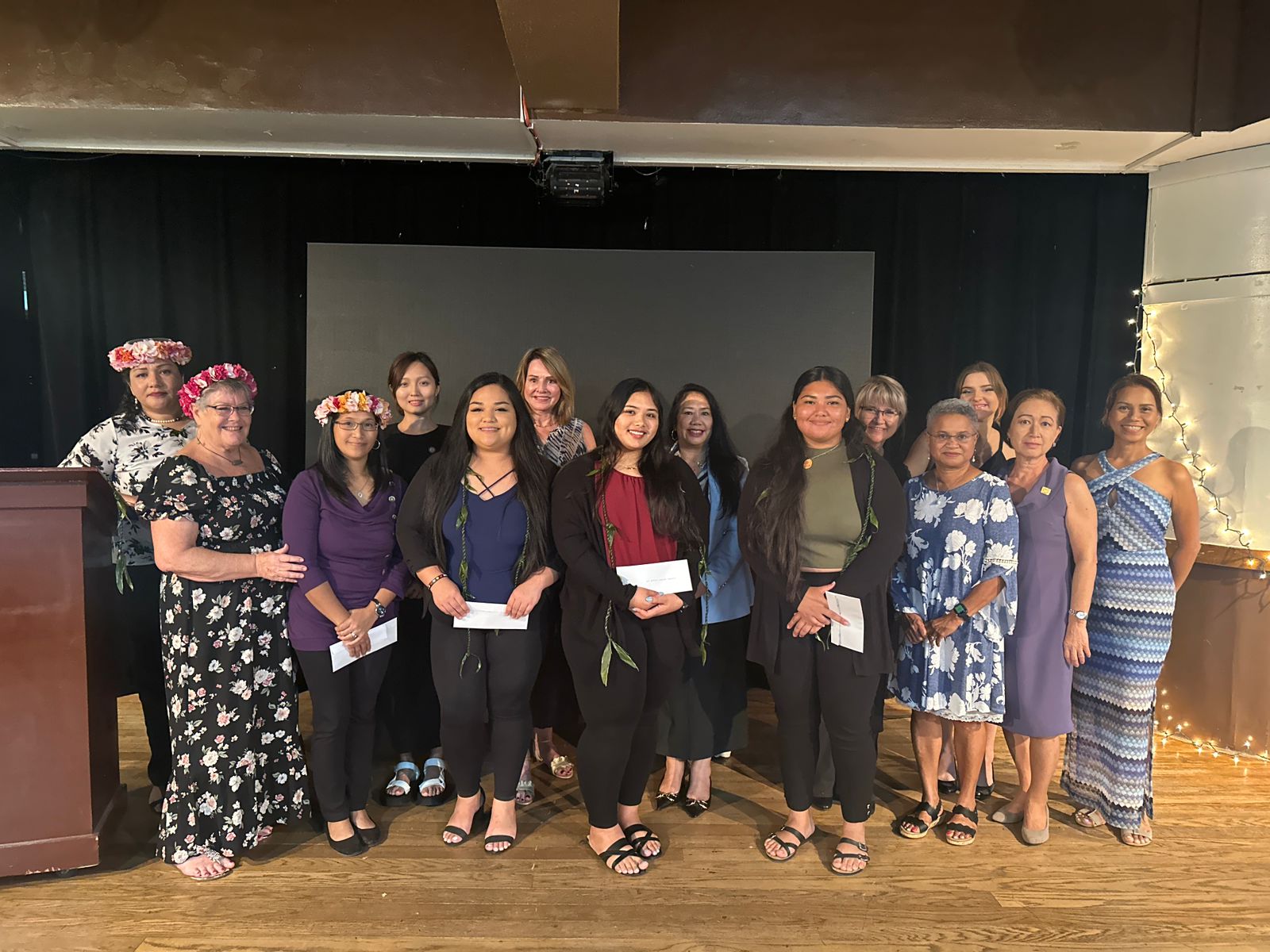 Second row, from left, Tania David, Soroptimist president-elect; Yijia Zhao, secretary; Donna Krum; Joann Aquino; Tatian Ilmova; Anastasia Shamanaeva. First row, from left, Maureen Sebangiol, president; Davilynn Varry Laniyo, this year's top winner; Reinalynn Attao, 1st runner up; Vertilia Camacho Cabrera, 2nd runner up; Christy Joy Aldan, 3rd runner up; Marilyn Marron; Suzy Perez; and Merle Byrd, treasurer.