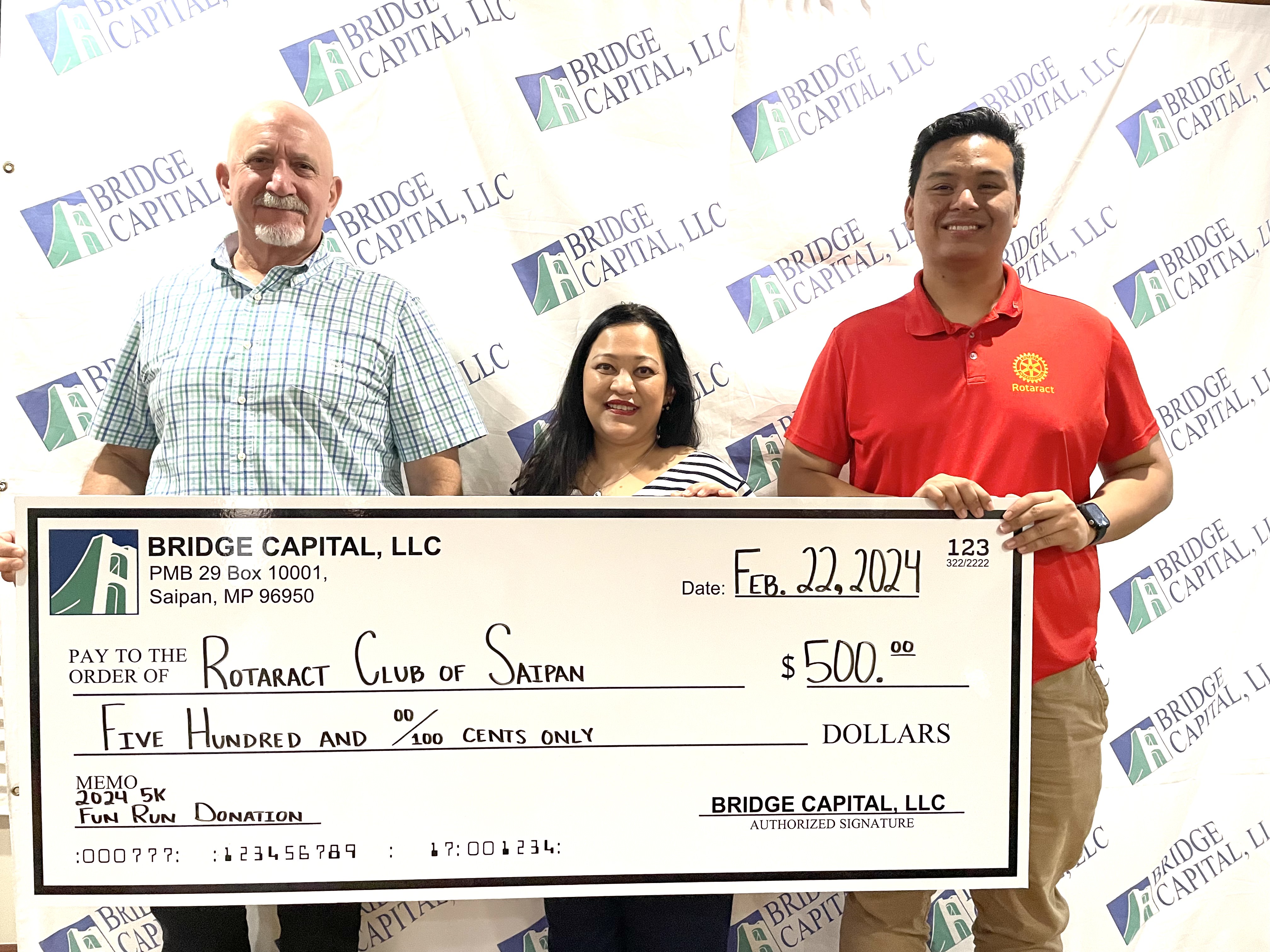 Bridge Capital is a proud gold sponsor of the Rotaract Club of Saipan’s 10 Years of Service 5K Fun Run presented by TurnKey Solutions! This Saturday’s fun run not only commemorates the 10 years since the club’s first charter, but also raises funds for the community service projects of the Rotaract Club of Saipan throughout the year. From left: Bridge Capital Vice President/General Manager Bartley A. Jackson, Bridge Capital Office Manager Julie Ann M. Duenas, and Rotaract Club of Saipan President Richard R. Baleares.