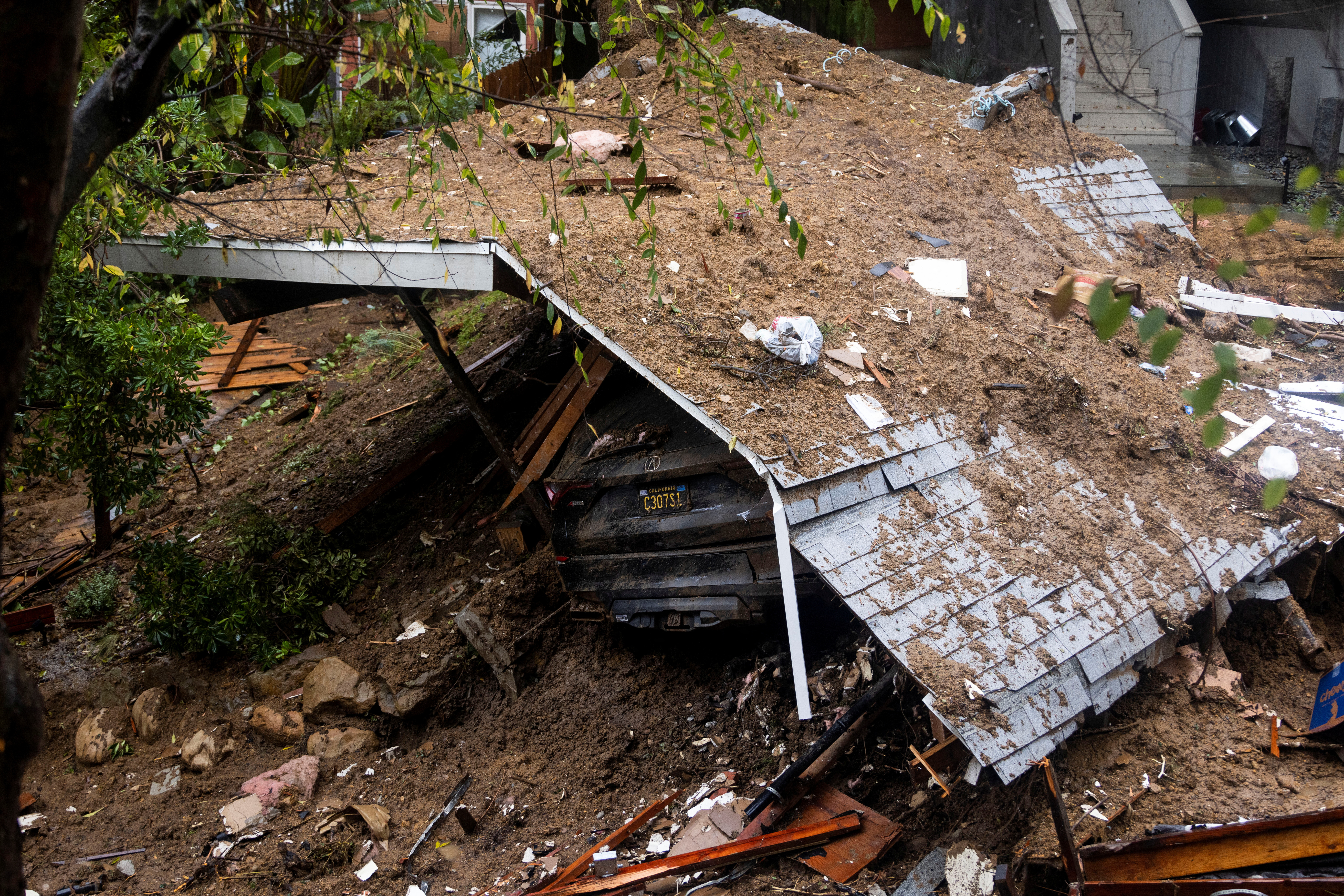 The remains of a home destroyed by a mudslide caused by the ongoing rain storm in Los Angeles, California, U.S., February 5, 2024. 