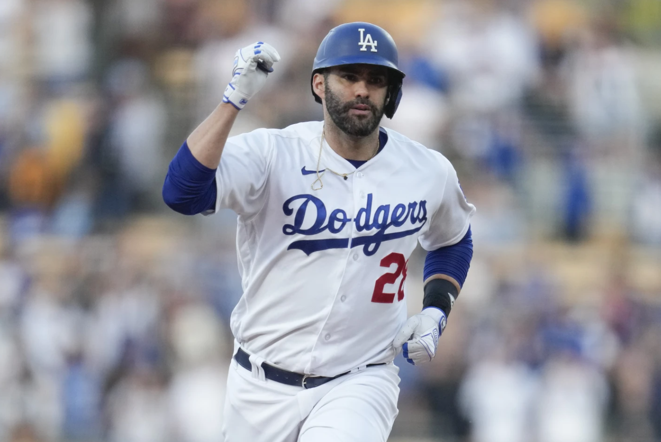 Los Angeles Dodgers designated hitter J.D. Martinez runs the bases after hitting a home run during the second inning of a baseball game against the San Francisco Giants in Los Angeles, Sept. 23, 2023.
