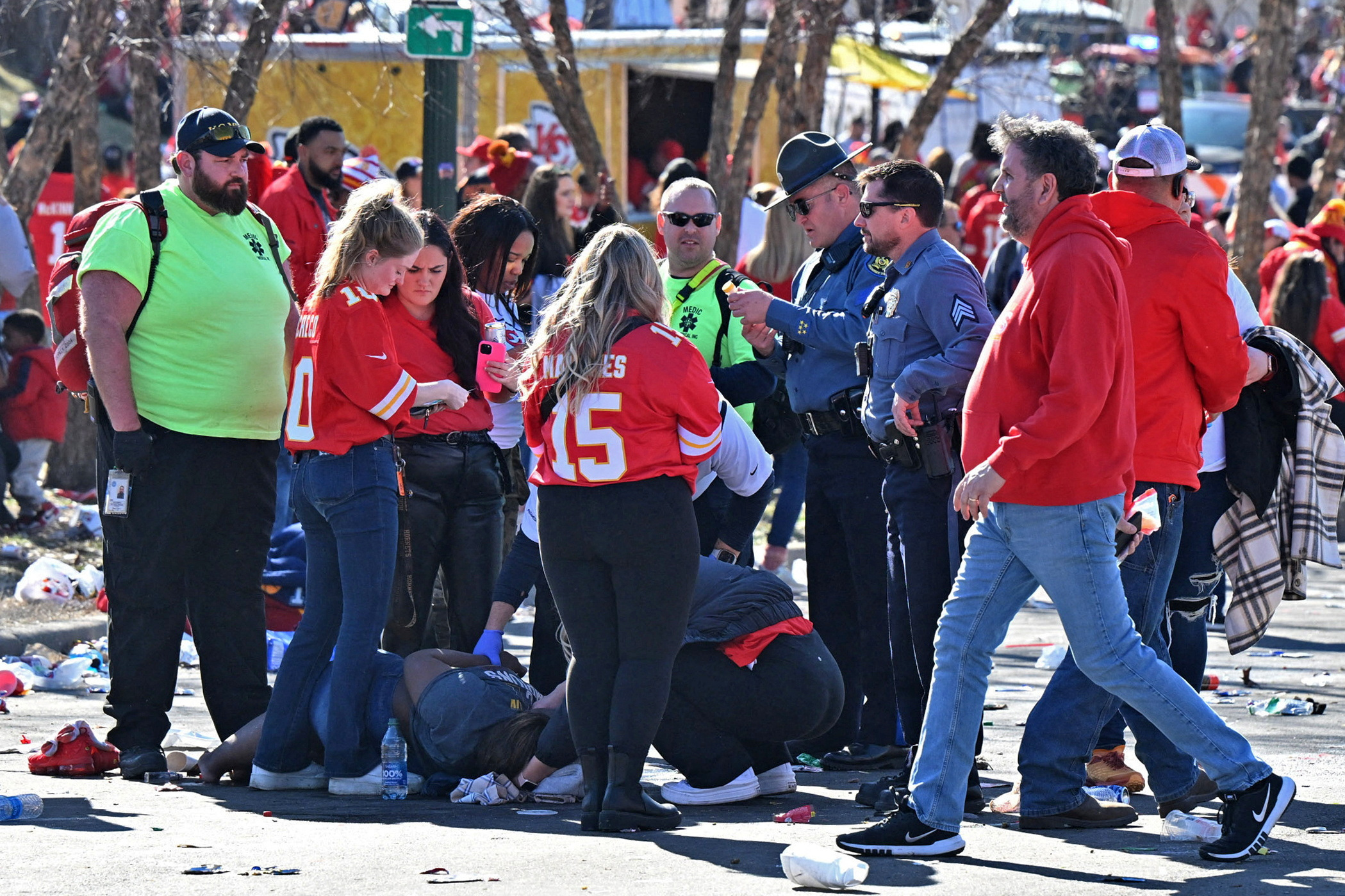 Feb 14, 2024; Kansas City, MO, USA; Police respond to injuries after shots were fired after the celebration of the Kansas City Chiefs winning Super Bowl LVIII. 