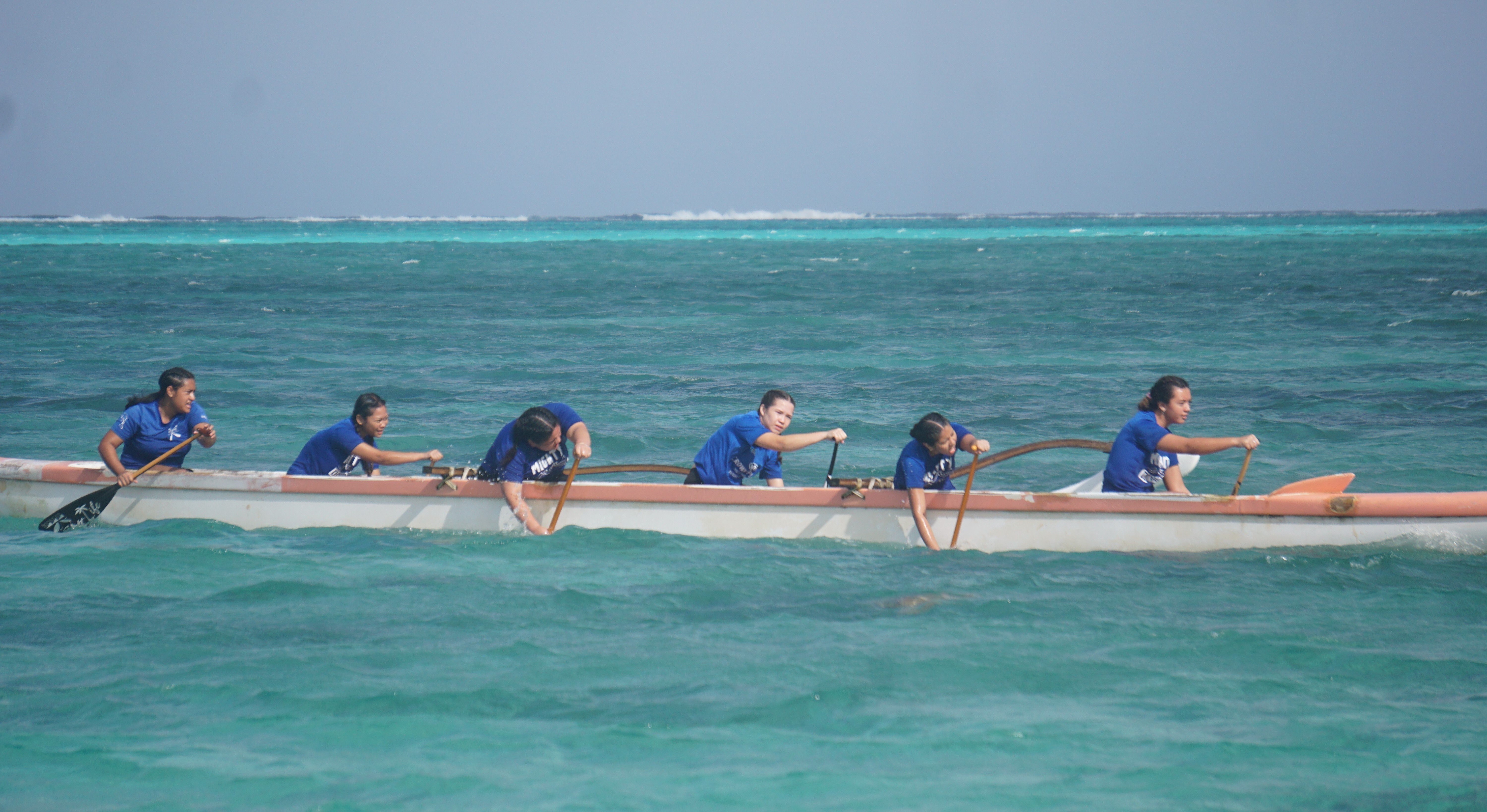 The MHS girls push through the finish line during the 1000m event of the co-ed high school division of the PSS Interscholastic Outrigger Race series at Kilili Beach.