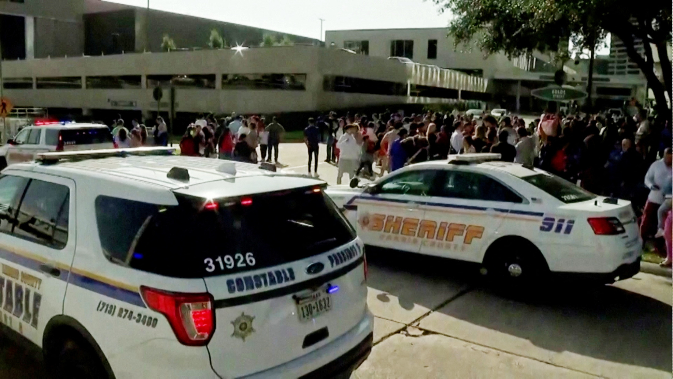 Law enforcement vehicles are parked outside the evacuated Lakewood Church of television evangelist Joel Osteen after a shooting incident in Houston, Texas, U.S. February 11, 2024 in a still image from video. 