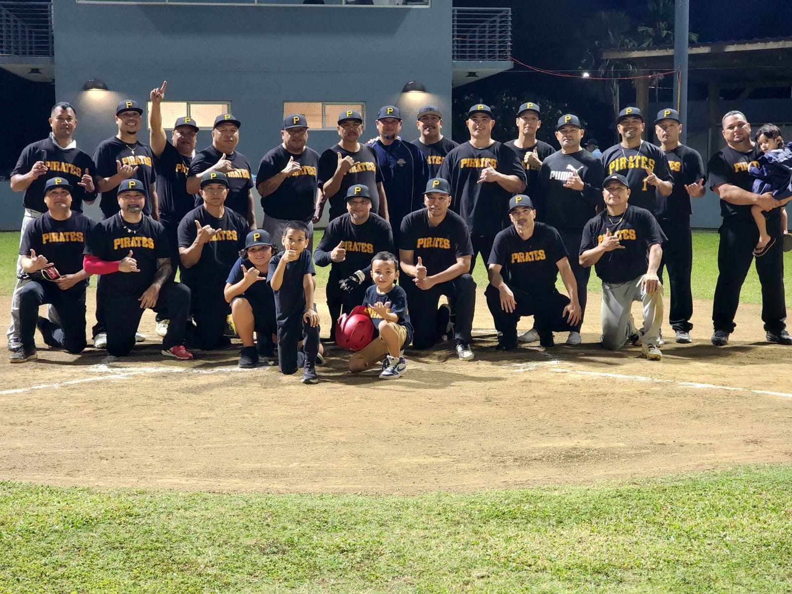 The Pirates pose for a group photo after winning the pennant of the 2023 SBL Masters League at the Francisco "Tan Ko" Palacios Baseball Field on Wednesday.