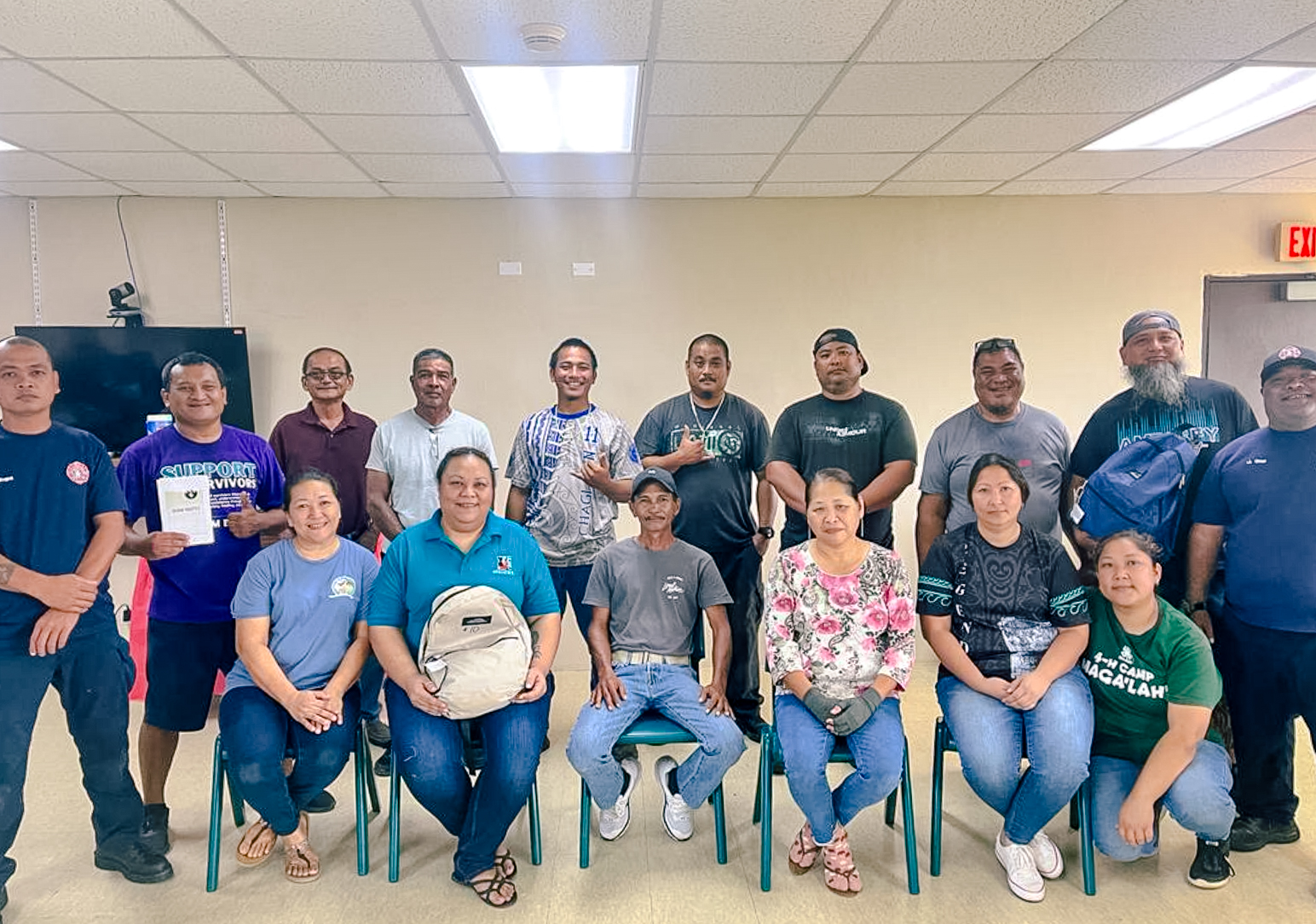 Participants from DPW, DCCA, and DOL gather for a group photo after successfully completing their training session on Rota.