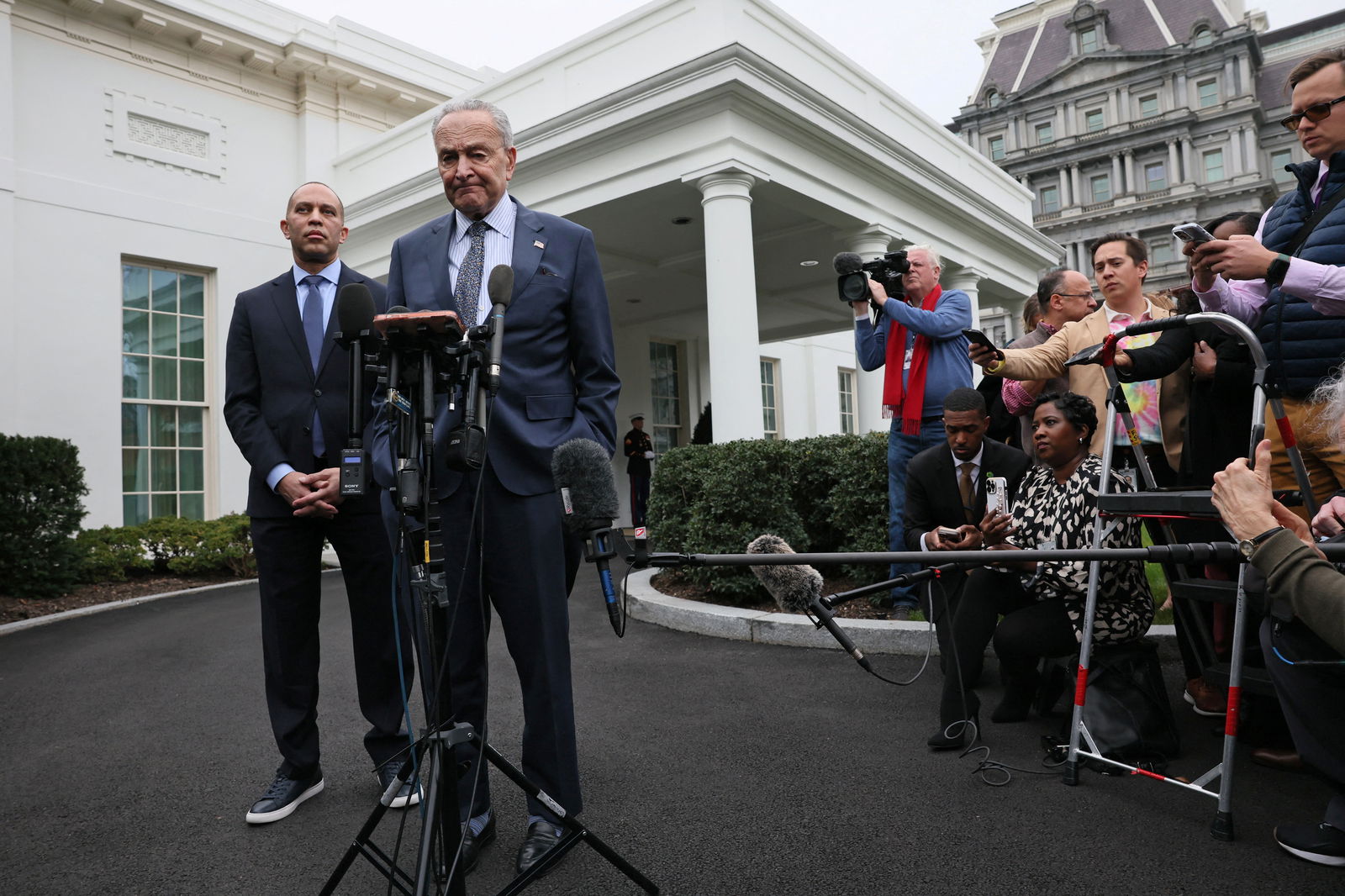 U.S. Senate Majority Leader Chuck Schumer (D-NY) and House Minority Leader Hakeem Jeffries (D-NY) give statements to members of the news media after meeting with President Joe Biden, Vice President Kamala Harris and Republican congressional leaders in the Oval Office at the White House in Washington, U.S., February 27, 2024. 