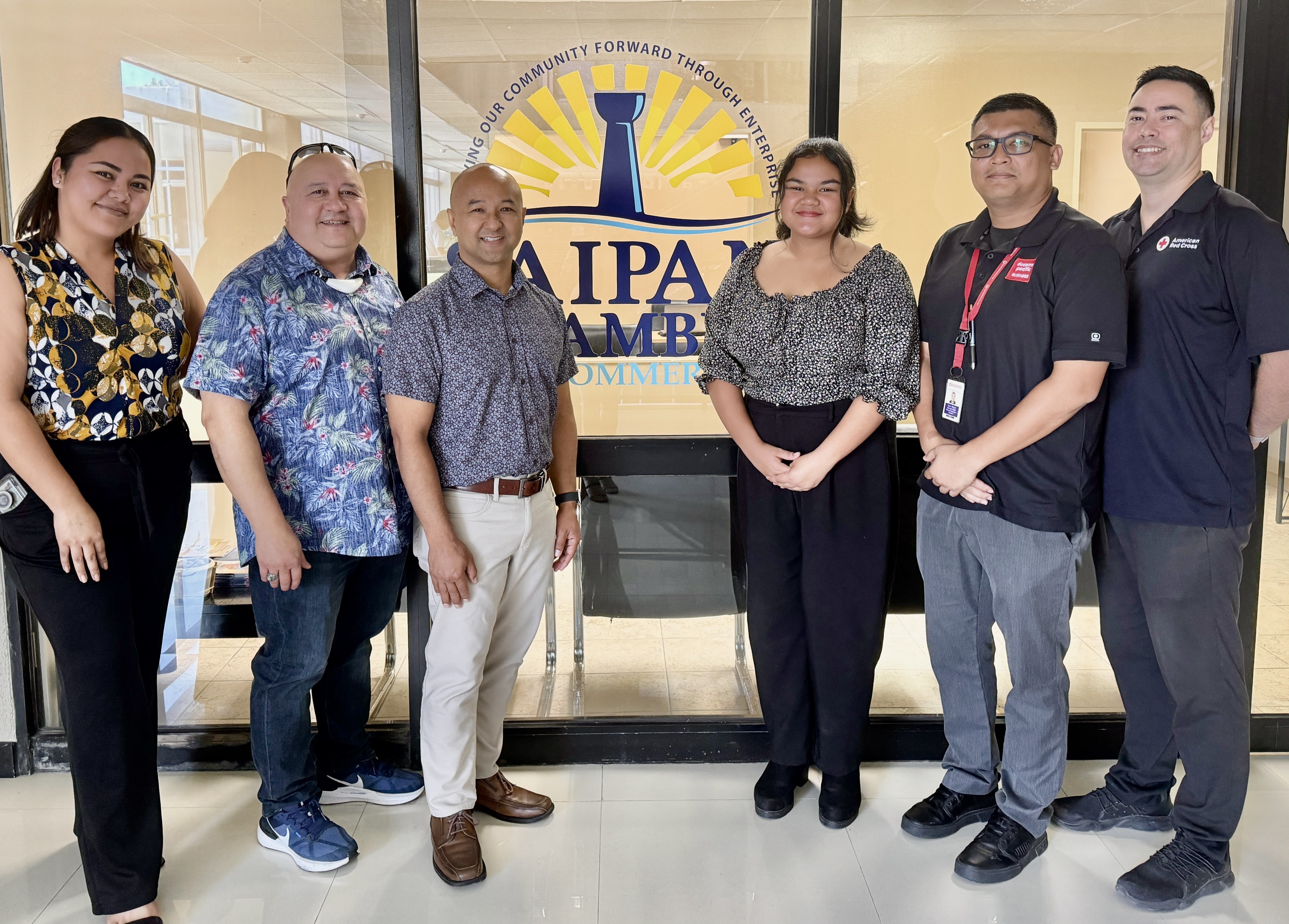 From left, Saipan Chamber of Commerce Executive Director, Kimberly Camacho, Commissioner of Education Dr. Lawrence Camacho, SCC Board President Joe Guerrero, Co-Op student Miracle Aldan, Board Director Kevin McCale and Vice President Dr. Joshua Wise.