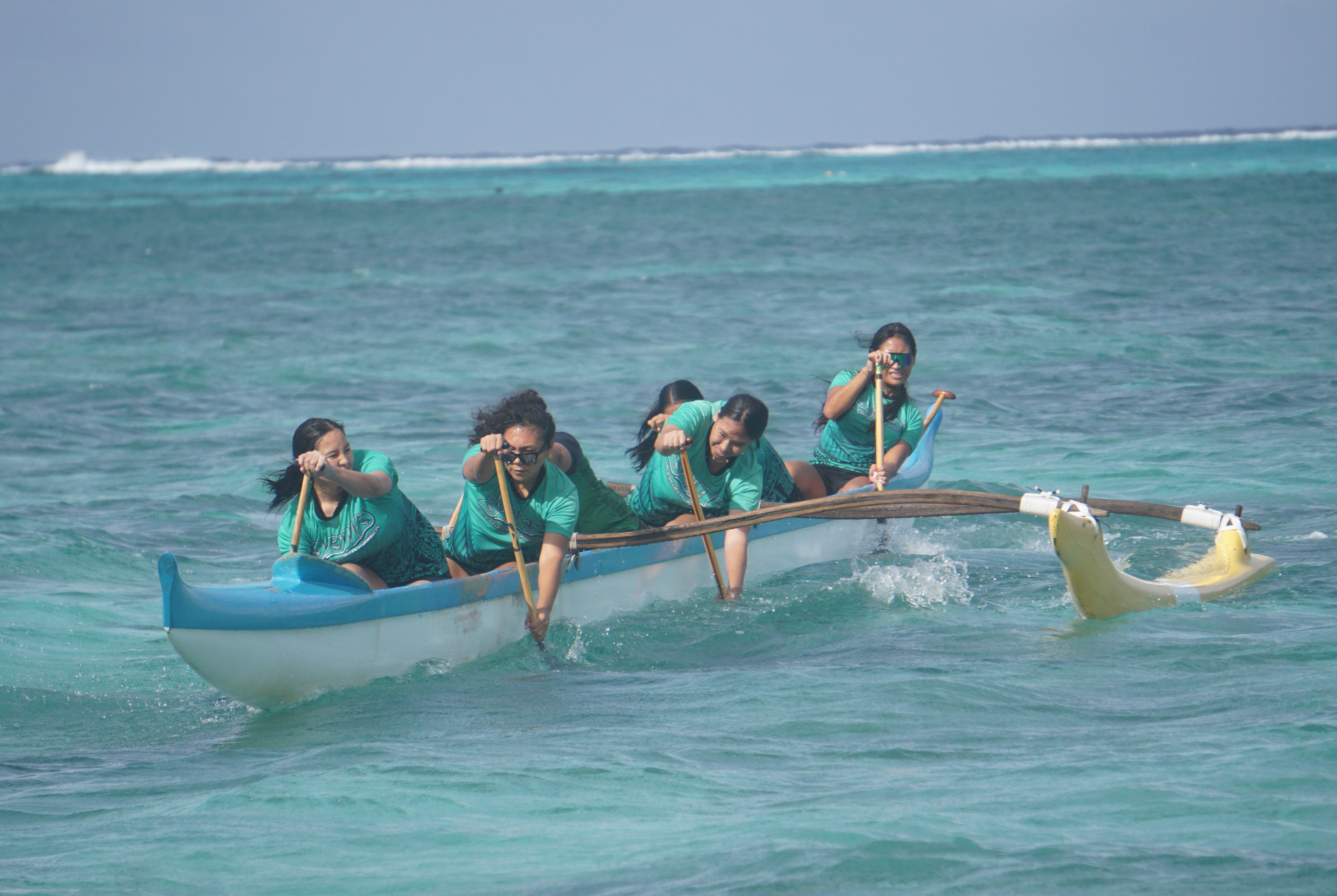 The SSHS girls slow down for the final turn during the 1000m  event of the co-ed high school division of the PSS Interscholastic Outrigger Race series at Kilili Beach.