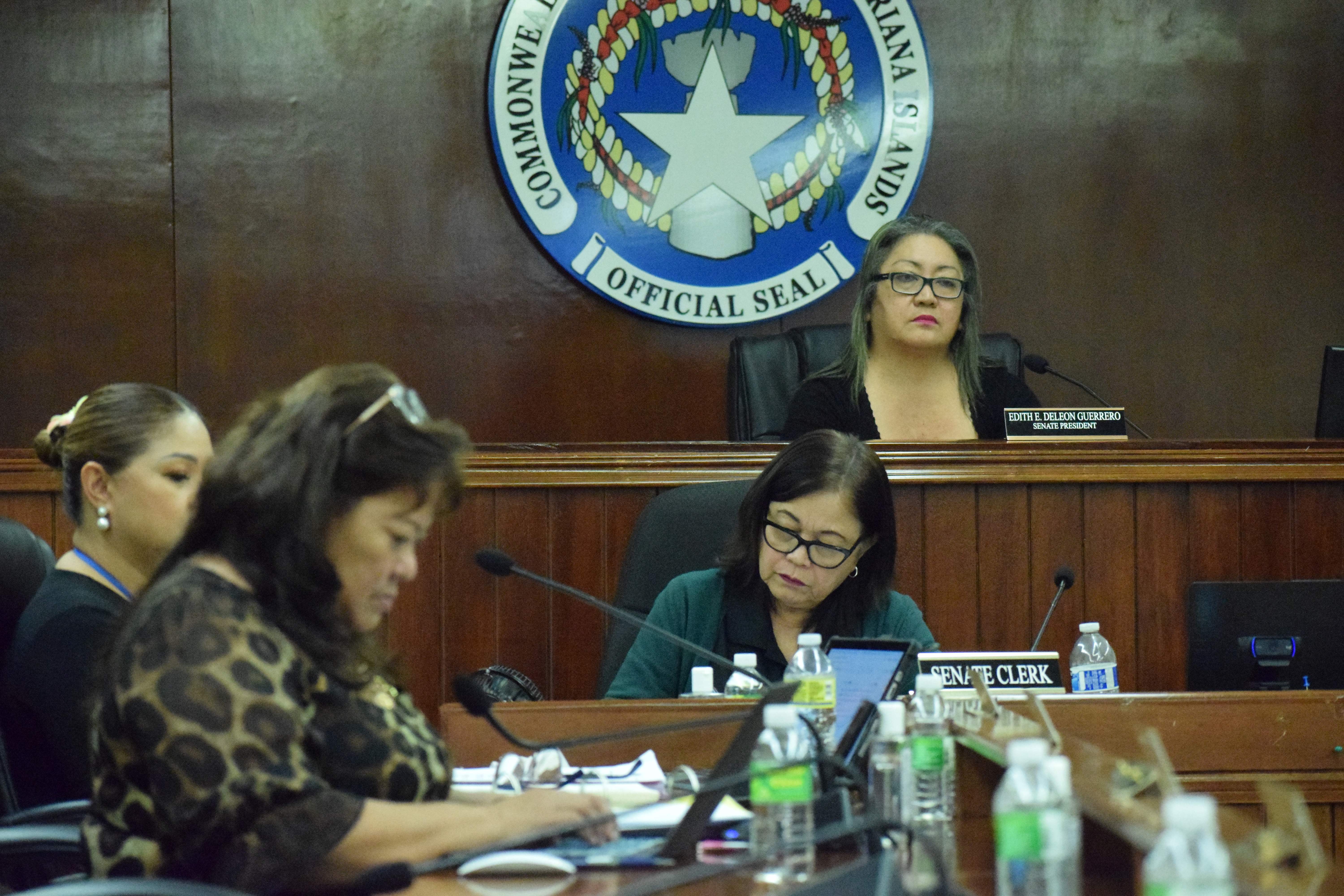 Senate President Edith Deleon Guerrero, right, presides over a session Friday while Senate Floor Leader Corina Magofna, Sen. Celina R. Babauta, and Senate clerk Doris Bermudes review their notes.