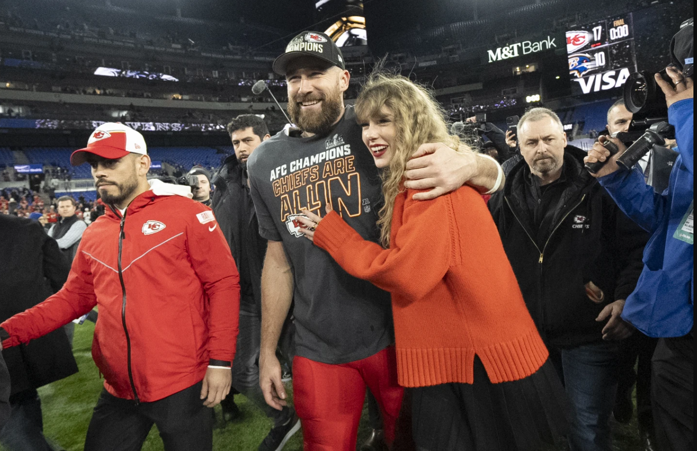 Kansas City tight end Travis Kelce and Taylor Swift walk together after an AFC championship game between the Chiefs and the Baltimore Ravens, Jan. 28, 2024 in Baltimore.